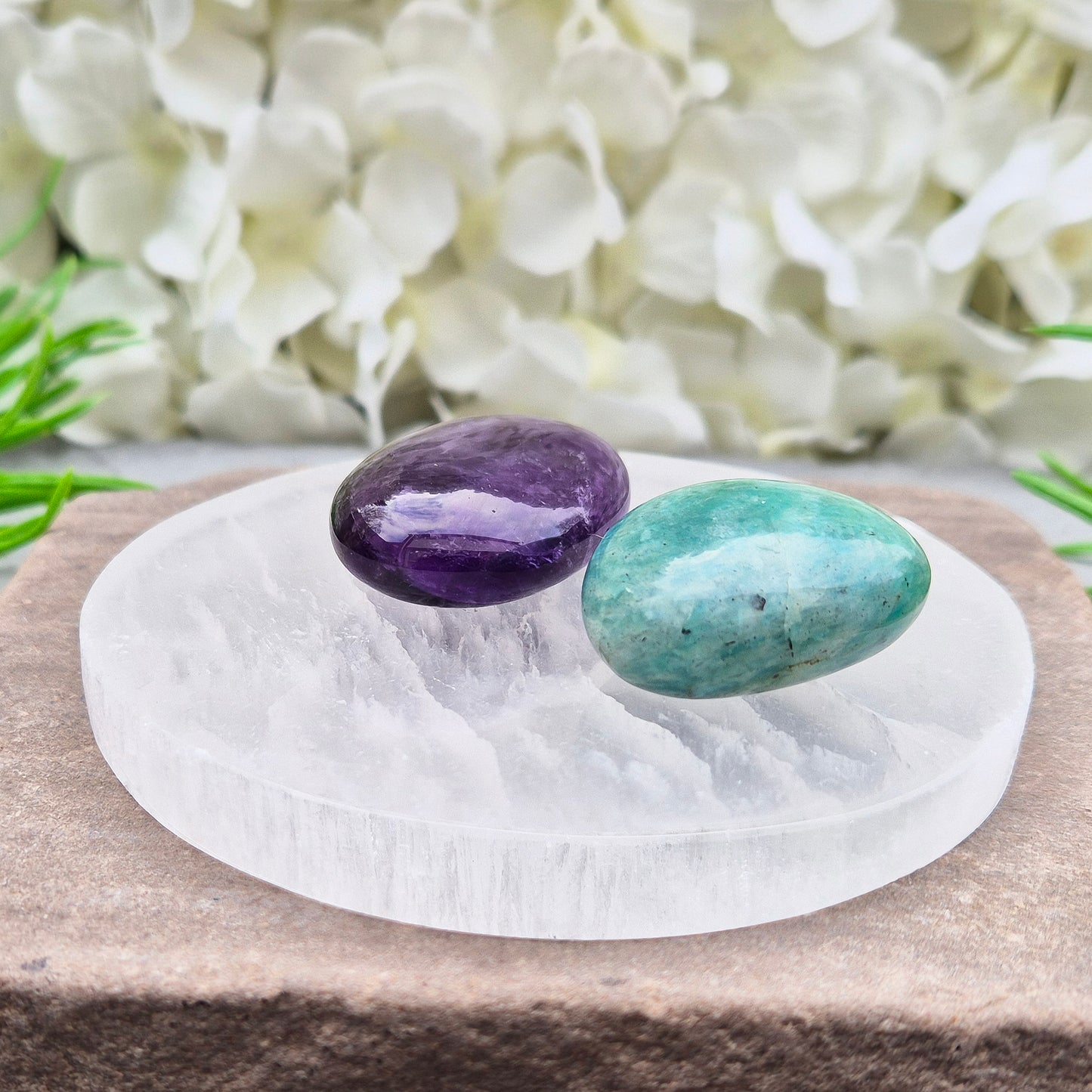 Polished Selenite charging plate that clears heavy energy and recharges your crystals. Ideal for daily cleansing.