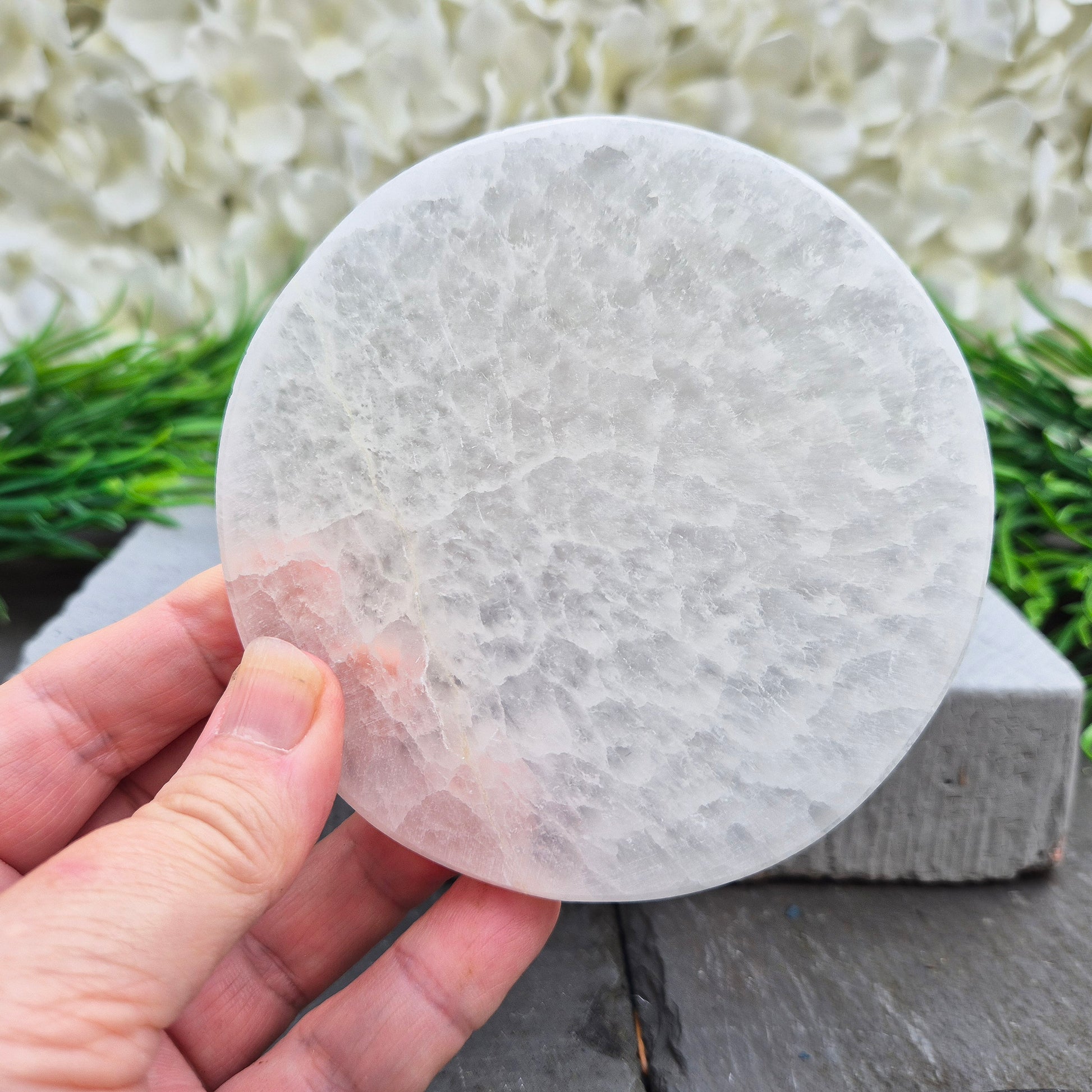 Polished Selenite charging plate that clears heavy energy and recharges your crystals. Ideal for daily cleansing.