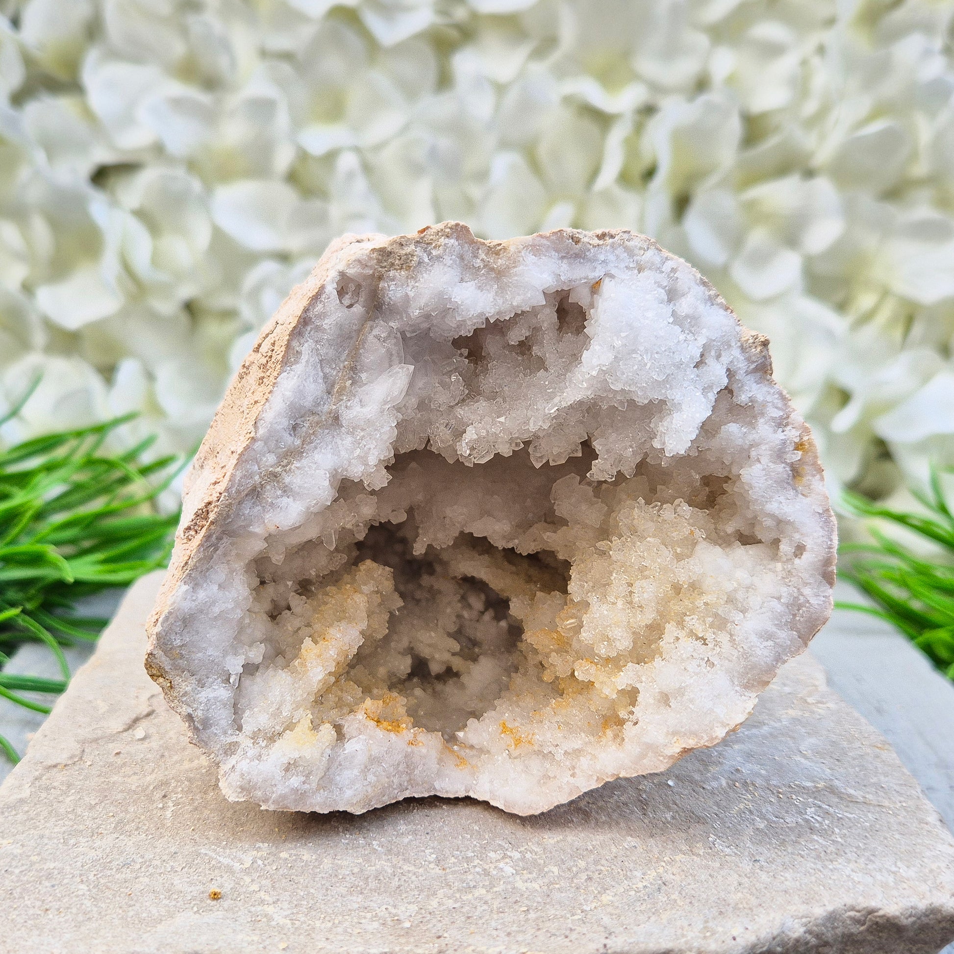 A natural quartz geode pair that fills your space with soft, uplifting energy. Ideal for calm home décor, meditation areas, and thoughtful gifting.
