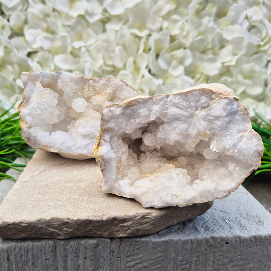 Quartz geode pair that brings a soothing, balanced atmosphere to any room. A lovely choice for home styling, meditation, and crystal lovers.