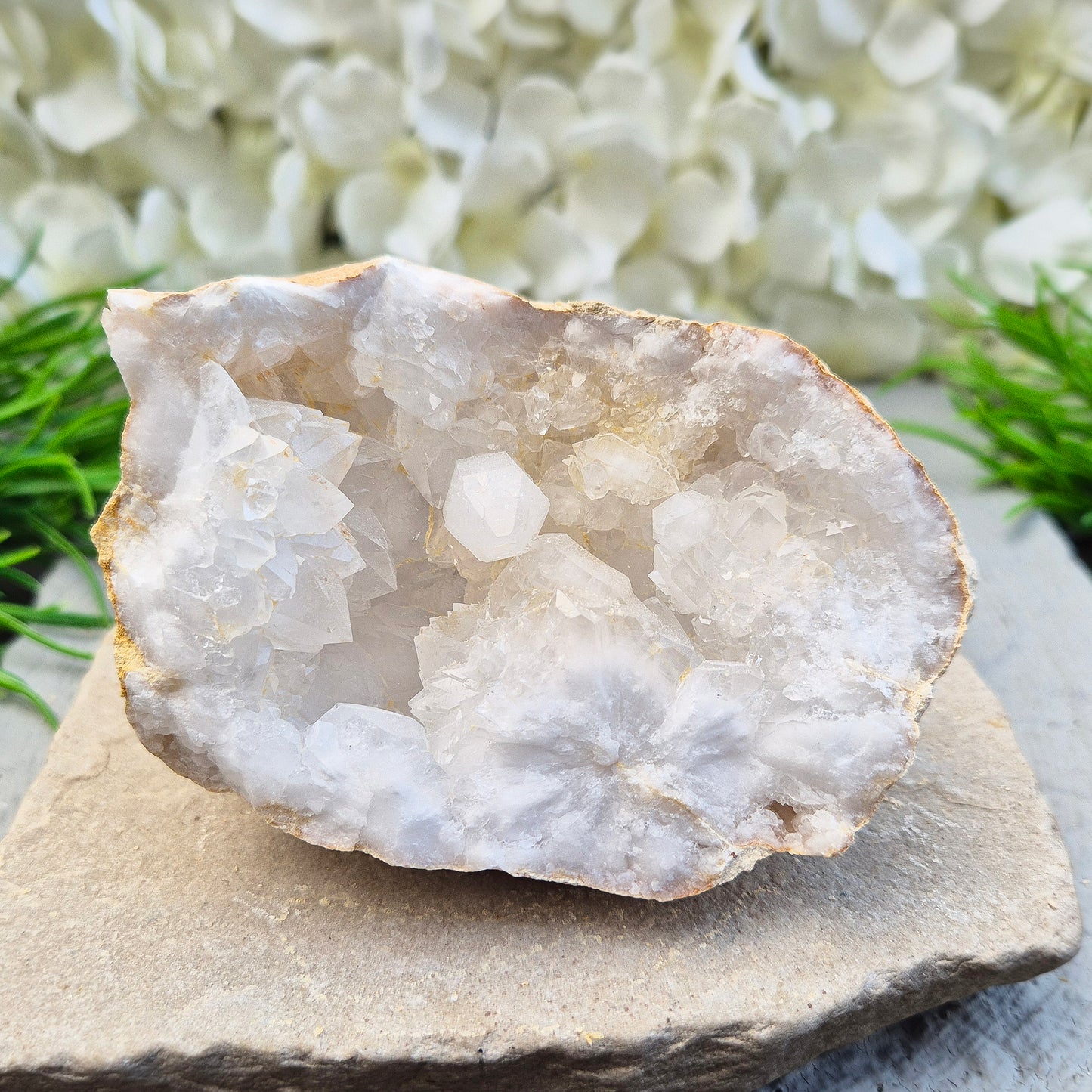 Quartz geode pair that brings a soothing, balanced atmosphere to any room. A lovely choice for home styling, meditation, and crystal lovers.