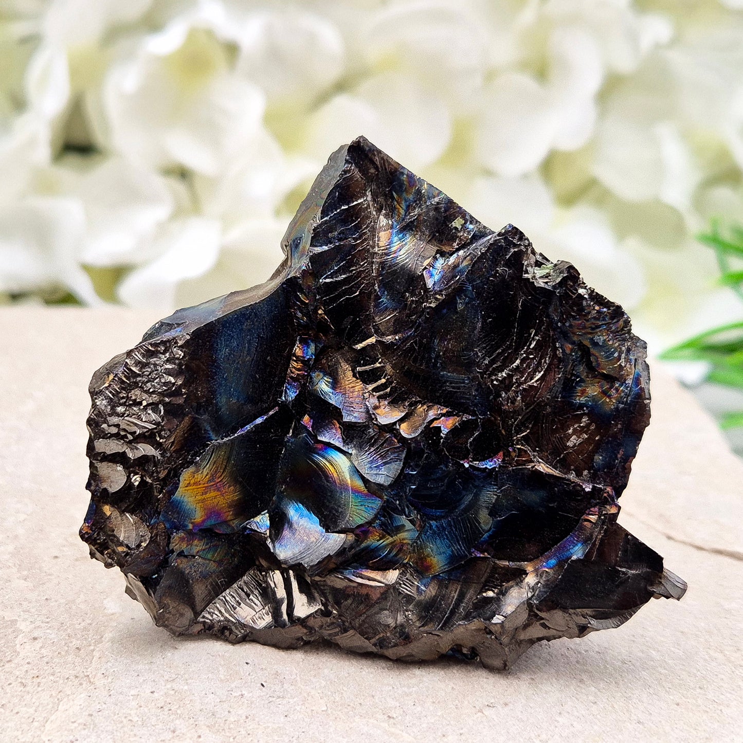 Raw Colombian Shungite from a rare carbon deposit. Grounding, protective and naturally iridescent. Perfect for home energy work and crystal collectors.