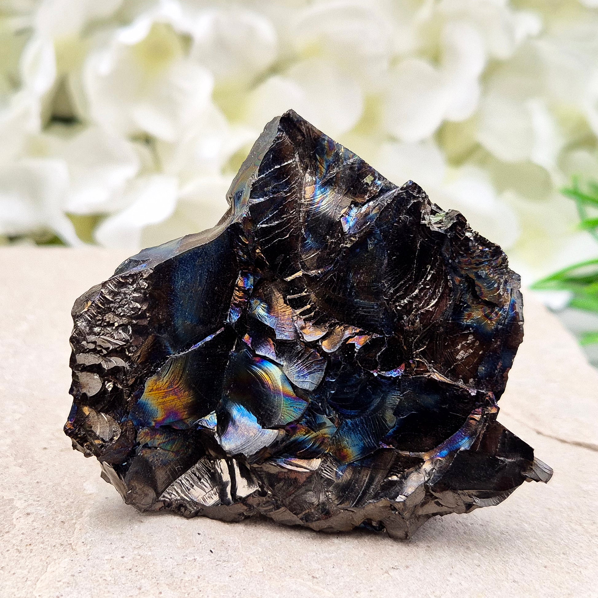 Raw Colombian Shungite from a rare carbon deposit. Grounding, protective and naturally iridescent. Perfect for home energy work and crystal collectors.