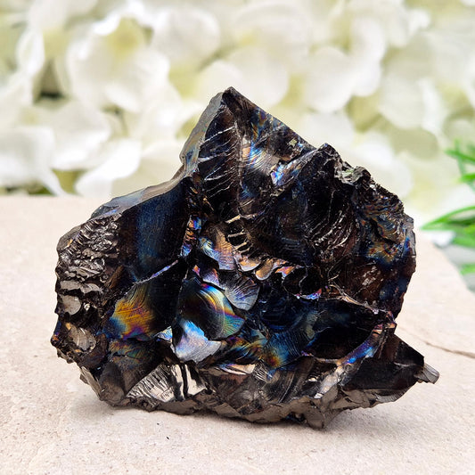 Raw Colombian Shungite from a rare carbon deposit. Grounding, protective and naturally iridescent. Perfect for home energy work and crystal collectors.