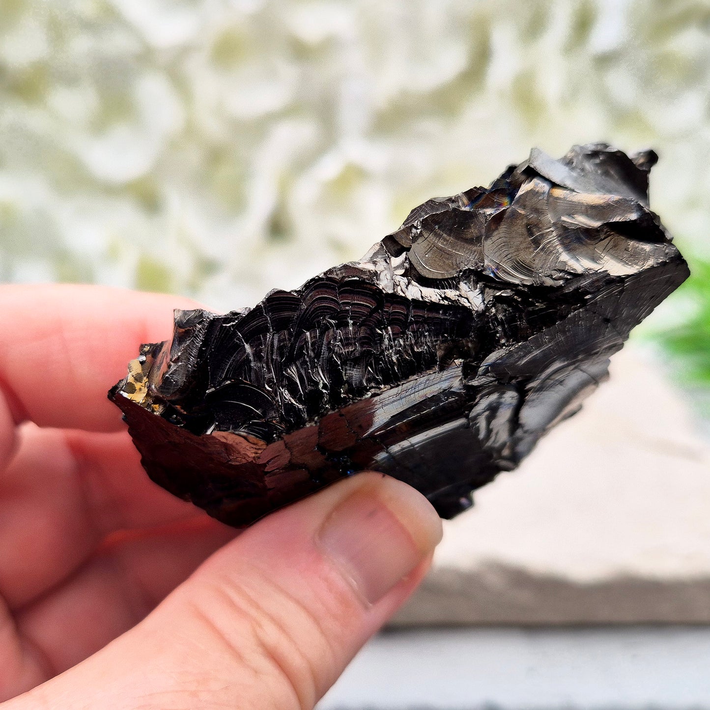 Raw Colombian Shungite from a rare carbon deposit. Grounding, protective and naturally iridescent. Perfect for home energy work and crystal collectors.