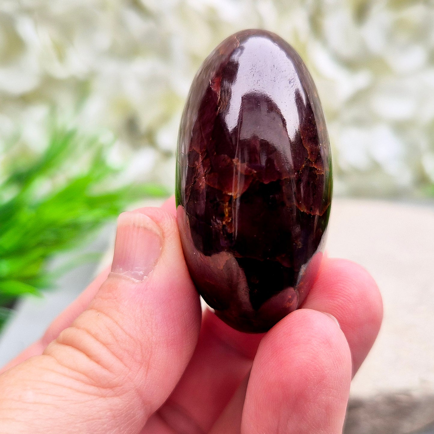 Natural Almandine-Pyrope Star Garnet palm stone. Sparkling, rare, and ideal for meditation, energy work, or display.