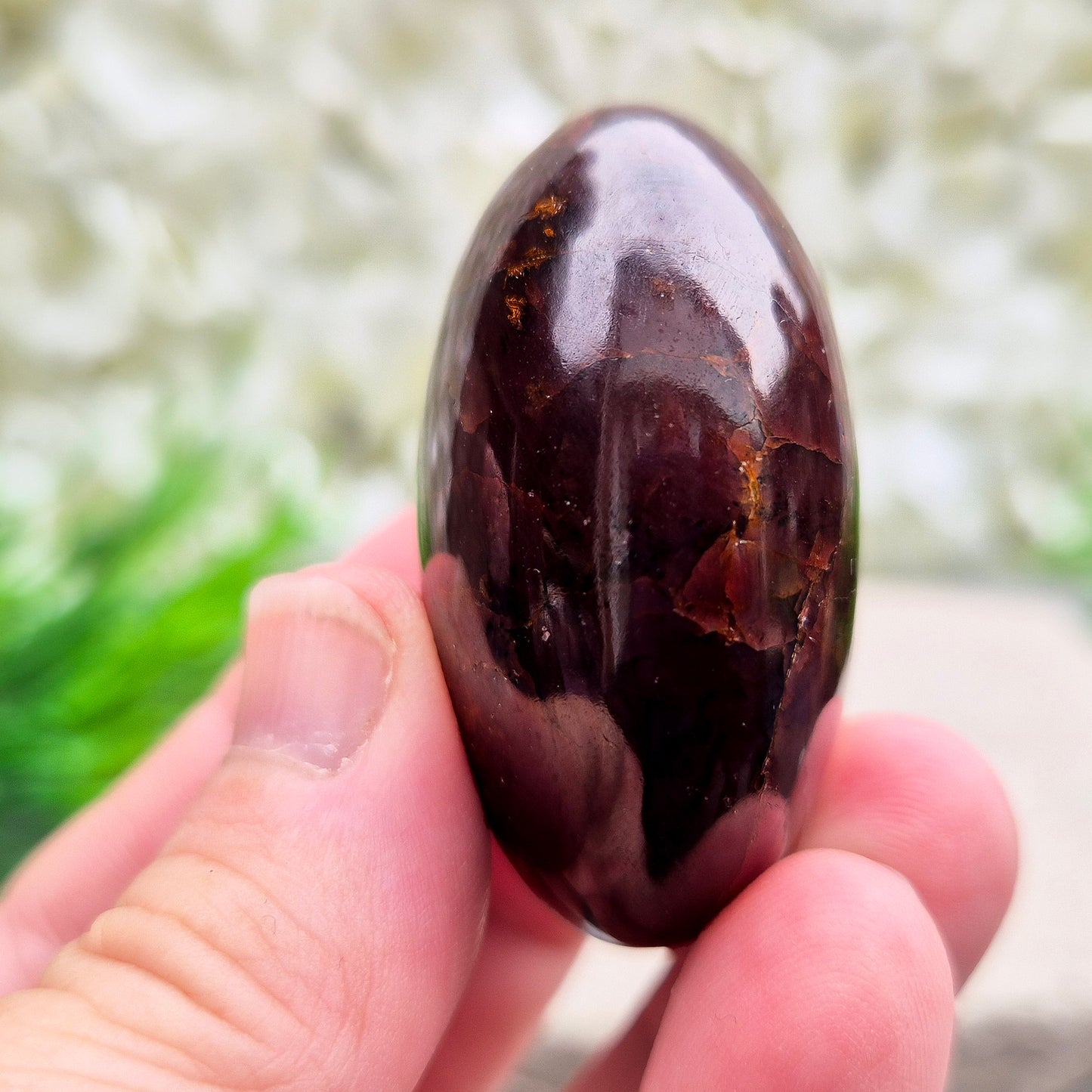 Natural Almandine-Pyrope Star Garnet palm stone. Sparkling, rare, and ideal for meditation, energy work, or display.