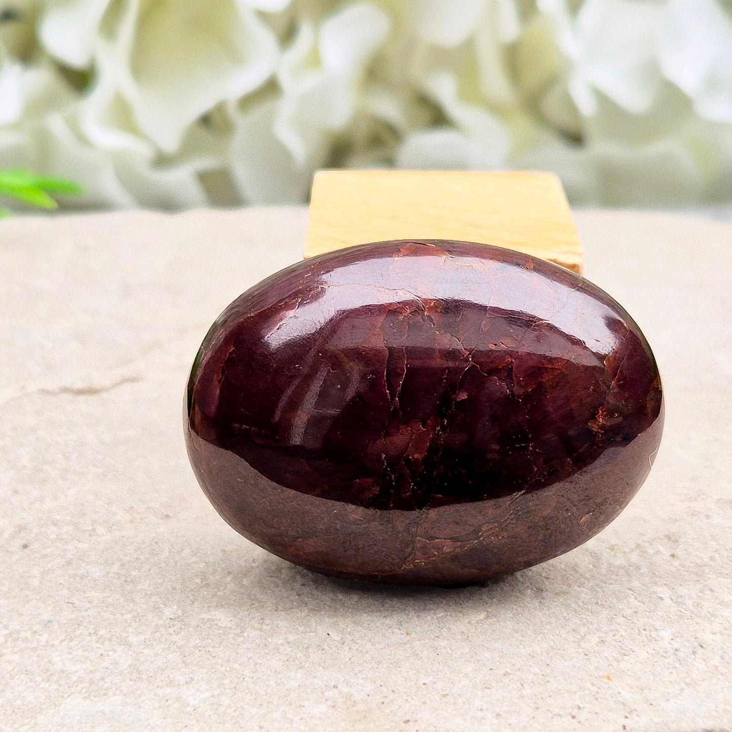 Natural Almandine-Pyrope Star Garnet palm stone. Sparkling, rare, and ideal for meditation, energy work, or display.