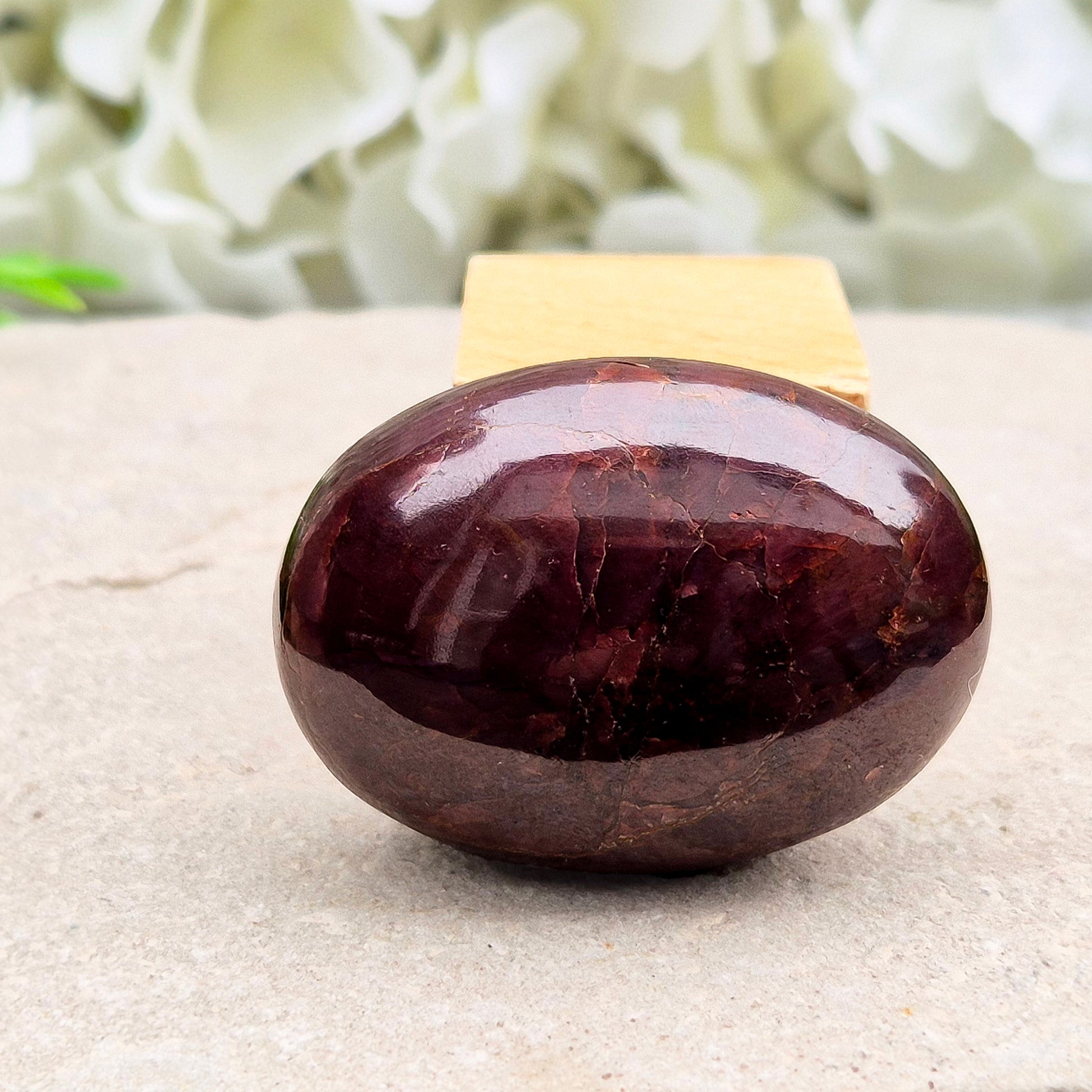 Natural Almandine-Pyrope Star Garnet palm stone. Sparkling, rare, and ideal for meditation, energy work, or display.
