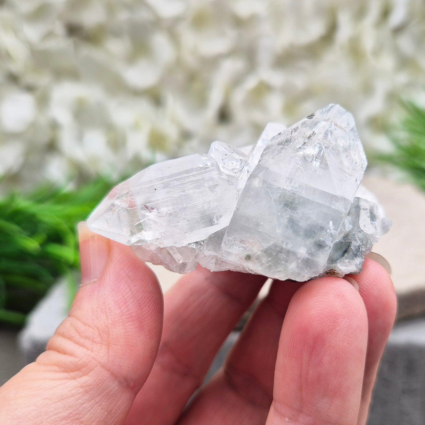 Apophyllite cluster with bright, sparkling points. A beautiful piece for uplifting energy, fresh space, and calm focus. Ideal for meditation or home décor.