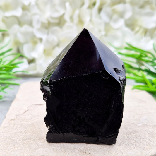 Grounding Black Obsidian standing point from Mexico. A strong, protective stone for focus, meditation, energy work, or display in your space.