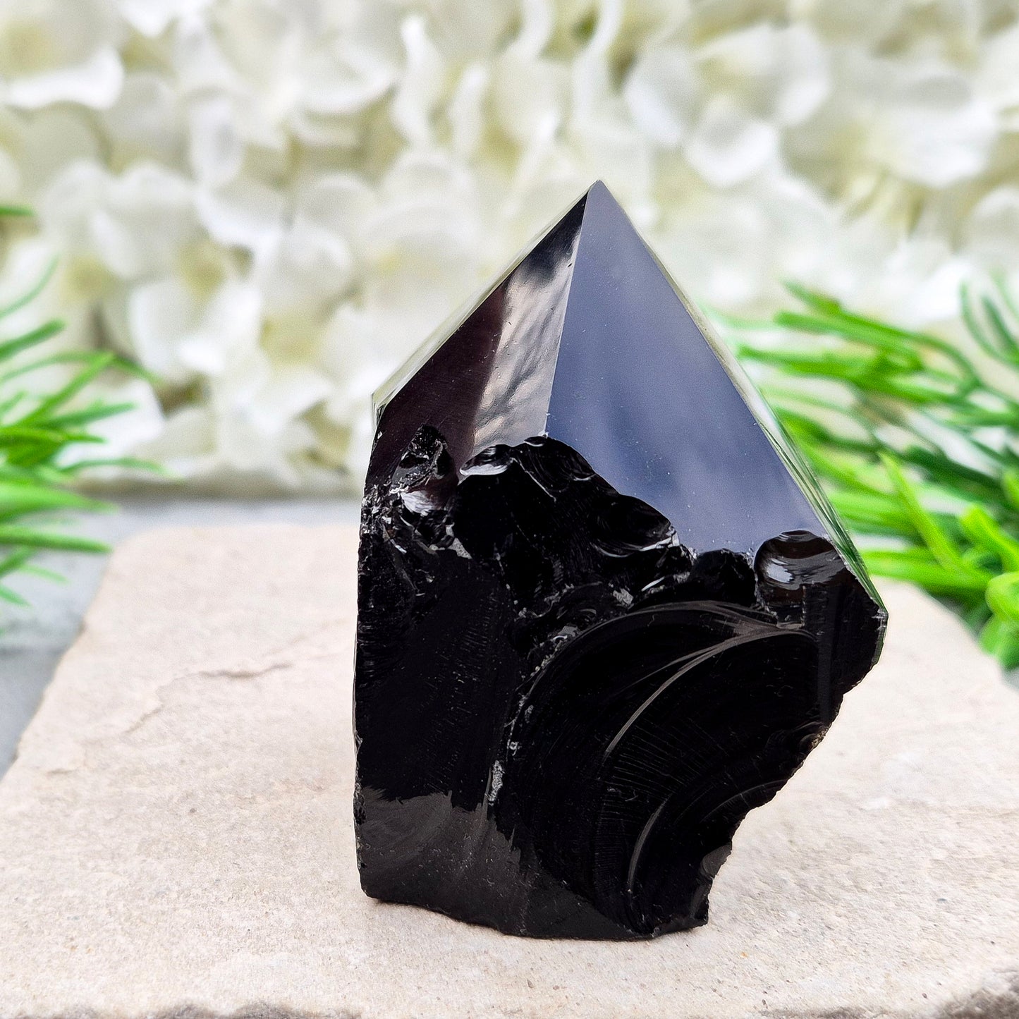 Grounding Black Obsidian standing point from Mexico. A strong, protective stone for focus, meditation, energy work, or display in your space.