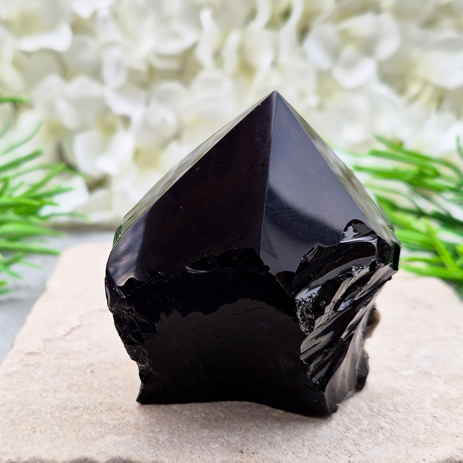 Grounding Black Obsidian standing point from Mexico. A strong, protective stone for focus, meditation, energy work, or display in your space.