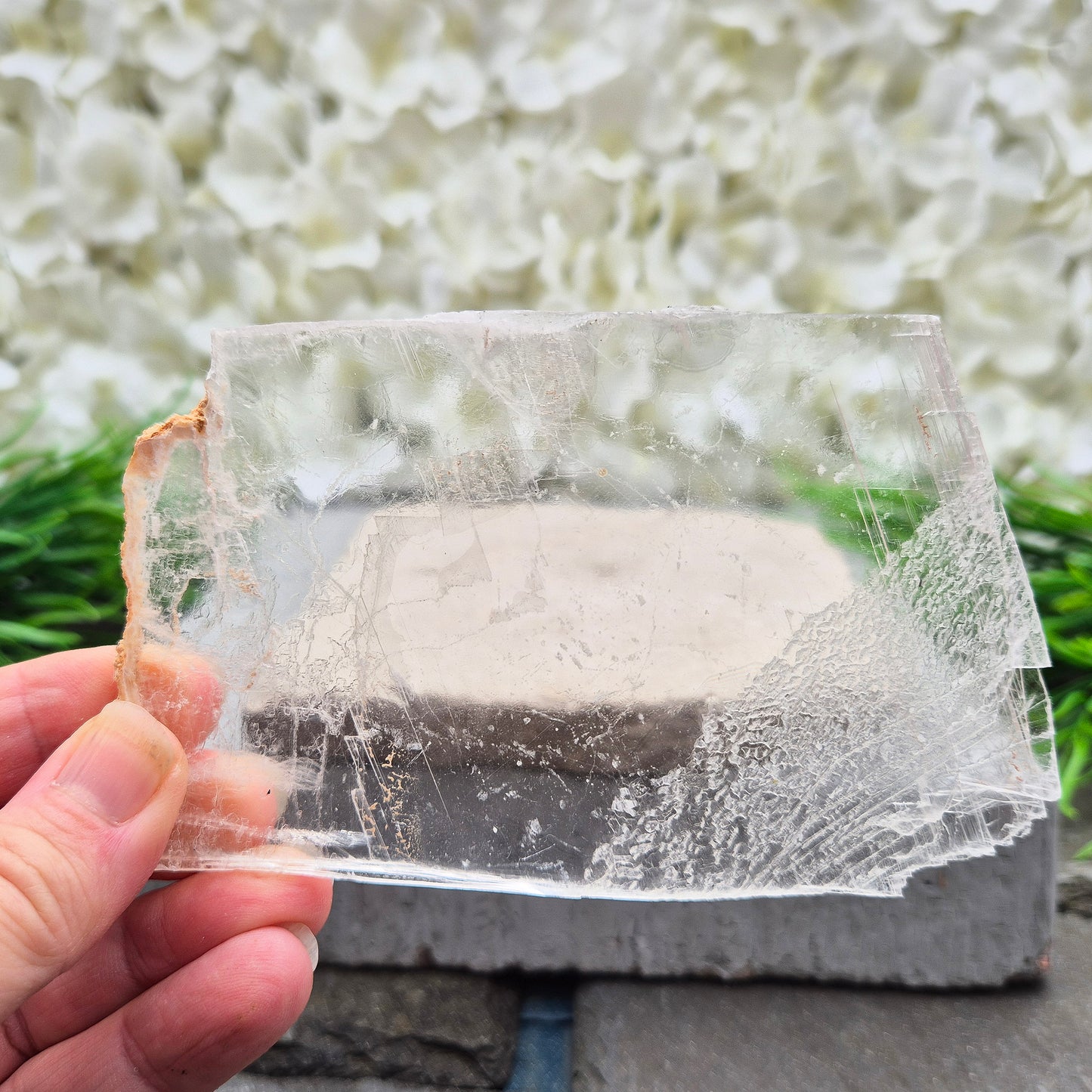 A natural gypsum window plate for cleansing and charging crystals. Clears stagnant energy, supports intuition, and keeps your space energetically fresh.