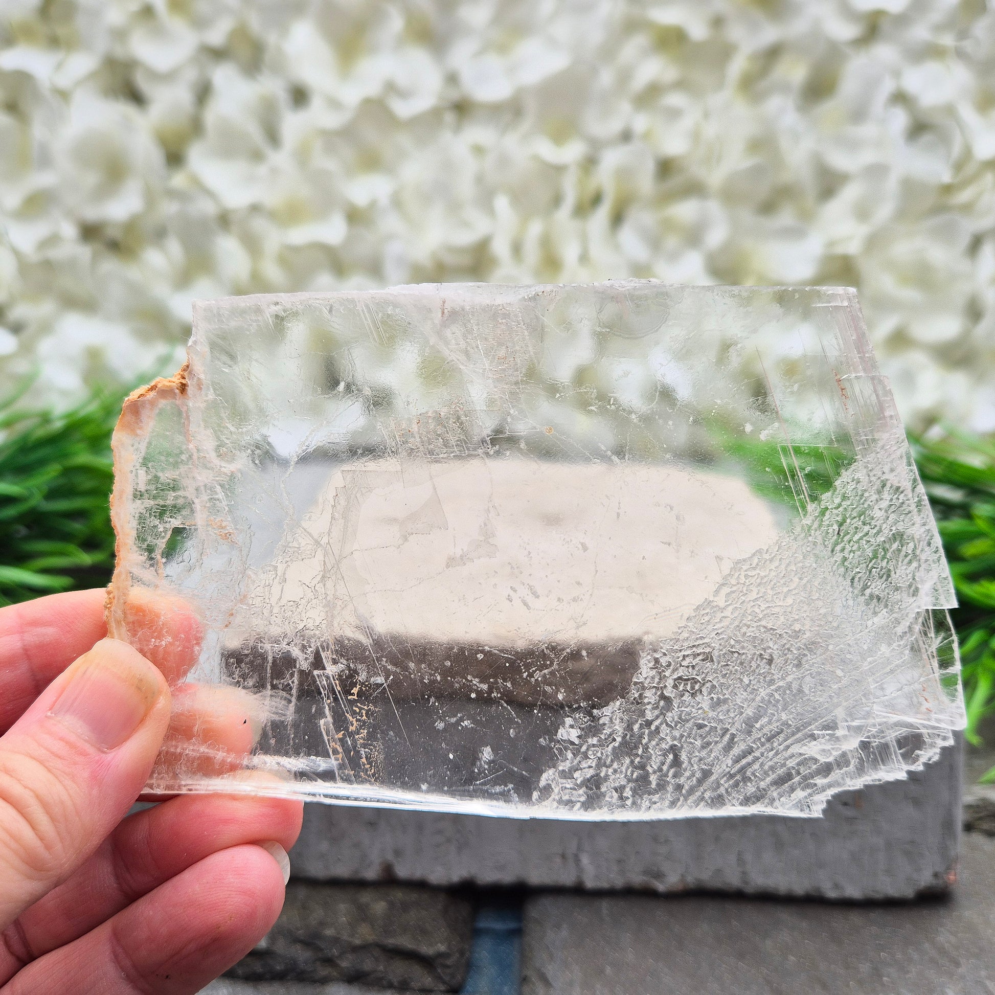 A natural gypsum window plate for cleansing and charging crystals. Clears stagnant energy, supports intuition, and keeps your space energetically fresh.