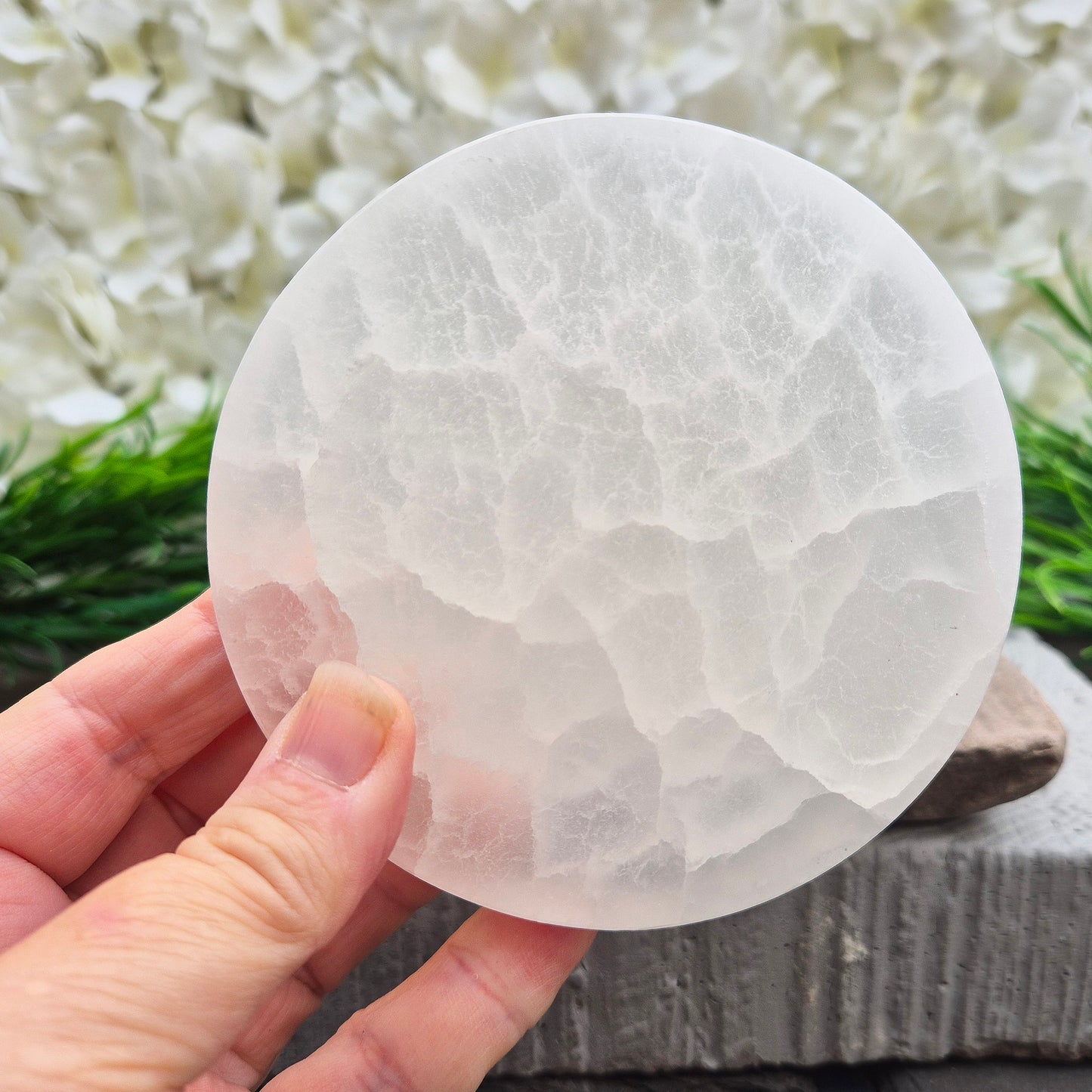 Selenite circular charging base for cleansing crystals and displaying your favourites. Ideal for clearing energy and keeping your stones refreshed.