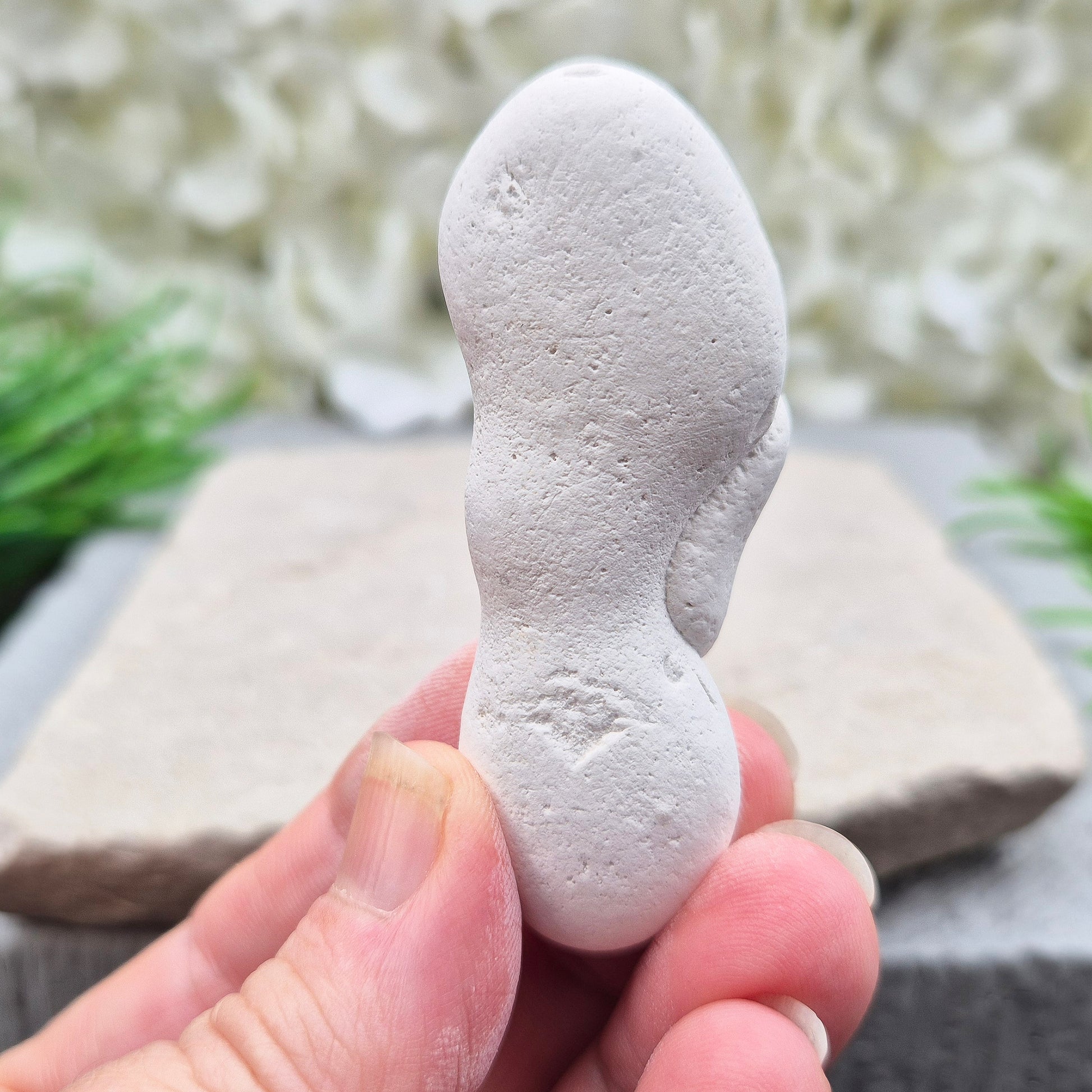 Natural Menalite with its distinctive earthy form and raw texture. Often chosen for grounding, intuitive work, and connecting with deep, ancient earth energy.