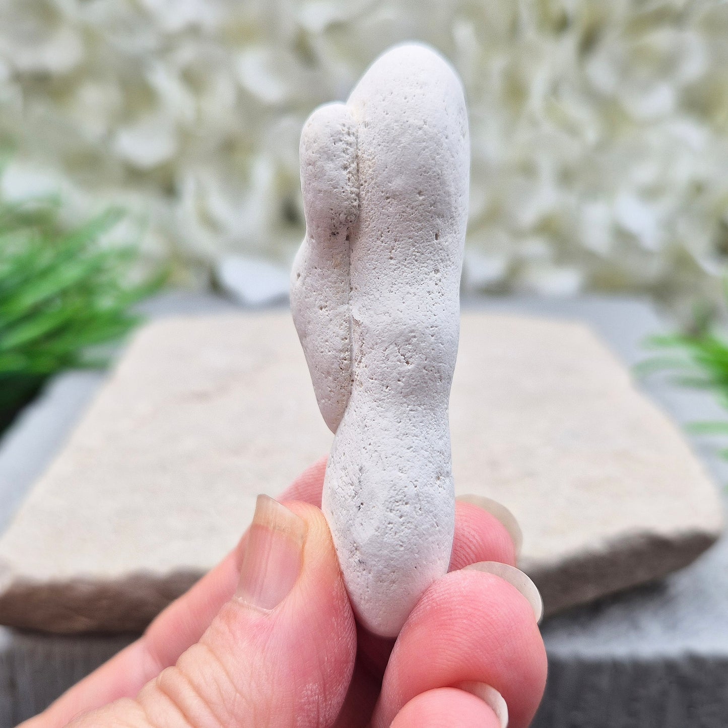 Natural Menalite with its distinctive earthy form and raw texture. Often chosen for grounding, intuitive work, and connecting with deep, ancient earth energy.