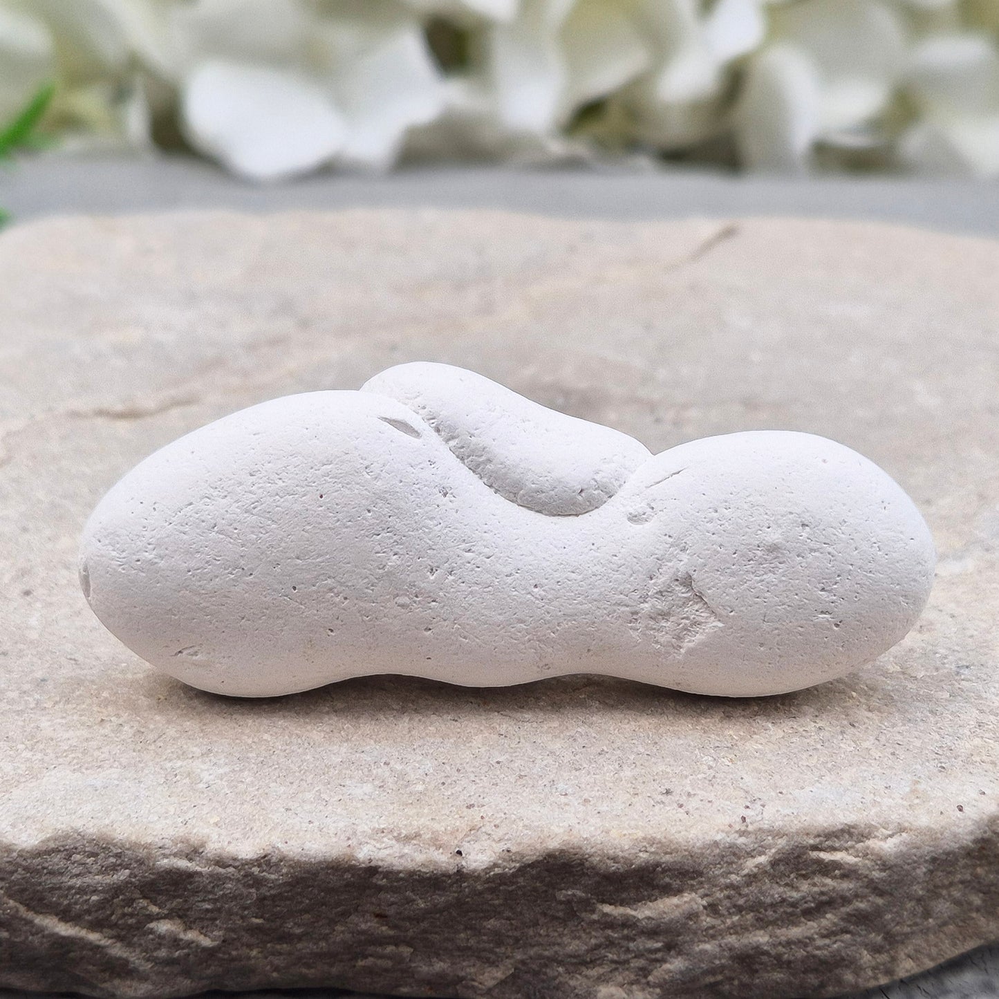 Natural Menalite with its distinctive earthy form and raw texture. Often chosen for grounding, intuitive work, and connecting with deep, ancient earth energy.