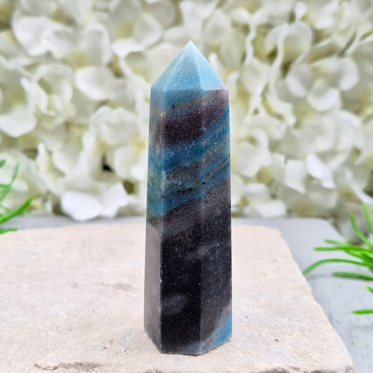 trolleite crystal tower – A calming, focus-enhancing crystal with a beautiful bluish-gray hue, perfect for reflection and personal insight. 