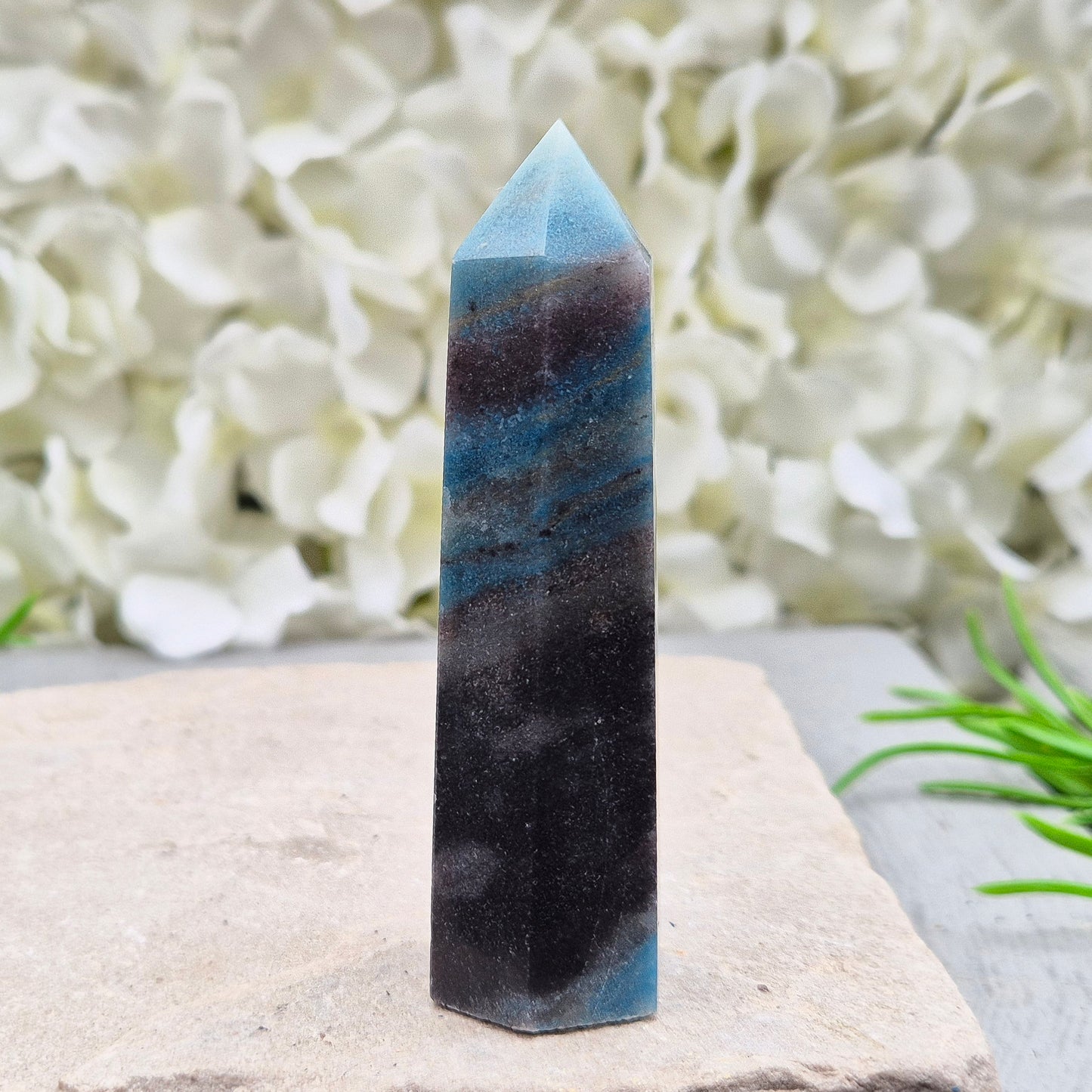 trolleite crystal tower – A calming, focus-enhancing crystal with a beautiful bluish-gray hue, perfect for reflection and personal insight. 