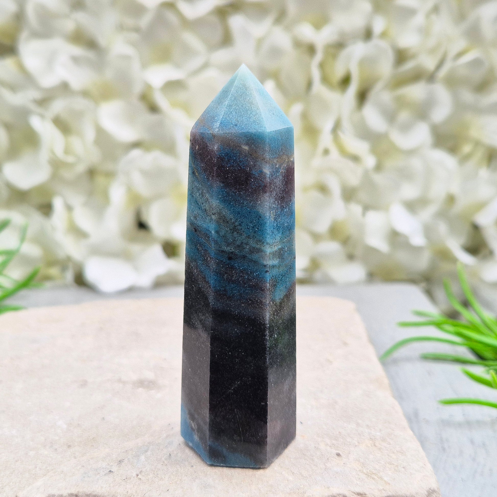trolleite crystal tower – A calming, focus-enhancing crystal with a beautiful bluish-gray hue, perfect for reflection and personal insight. 