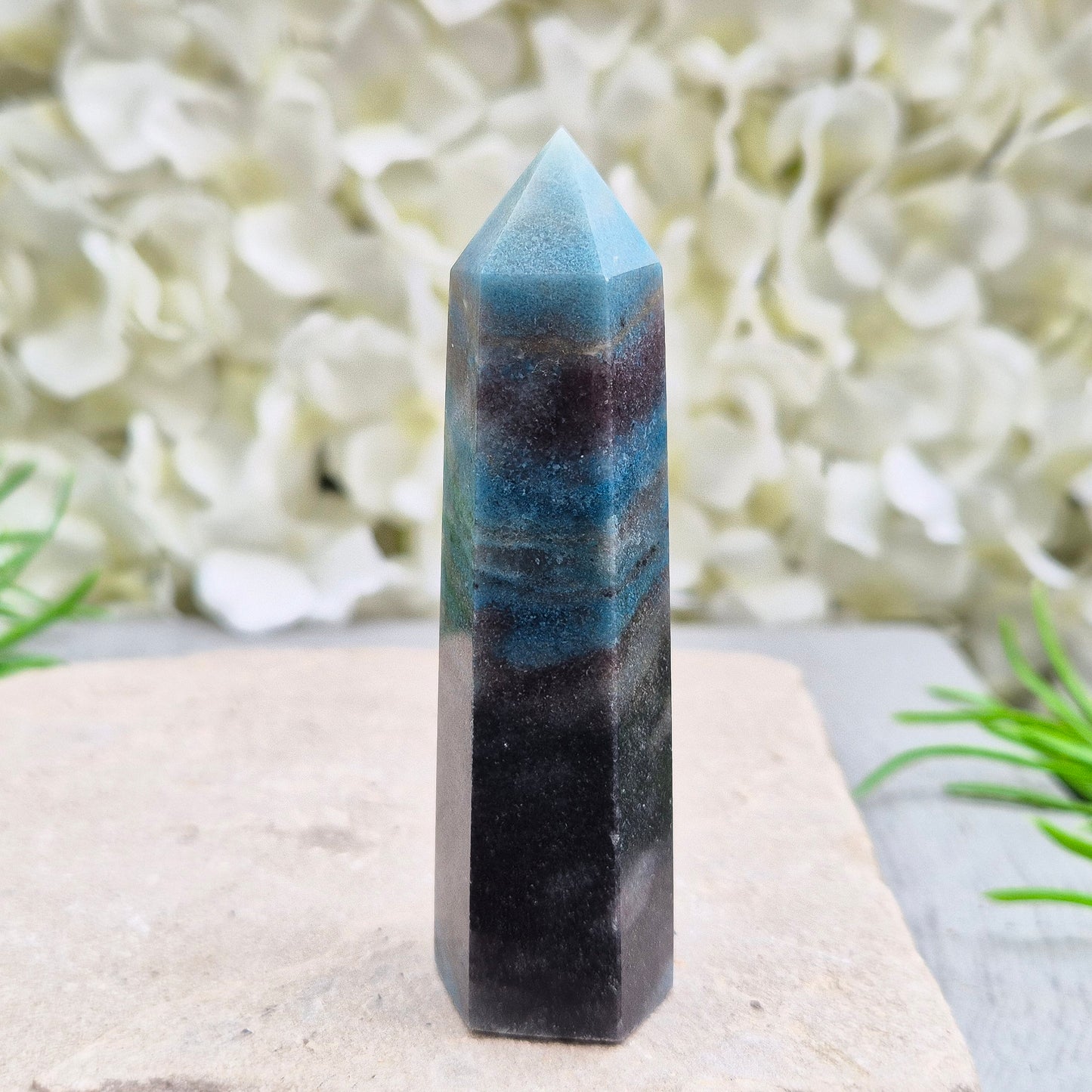 trolleite crystal tower – A calming, focus-enhancing crystal with a beautiful bluish-gray hue, perfect for reflection and personal insight. 
