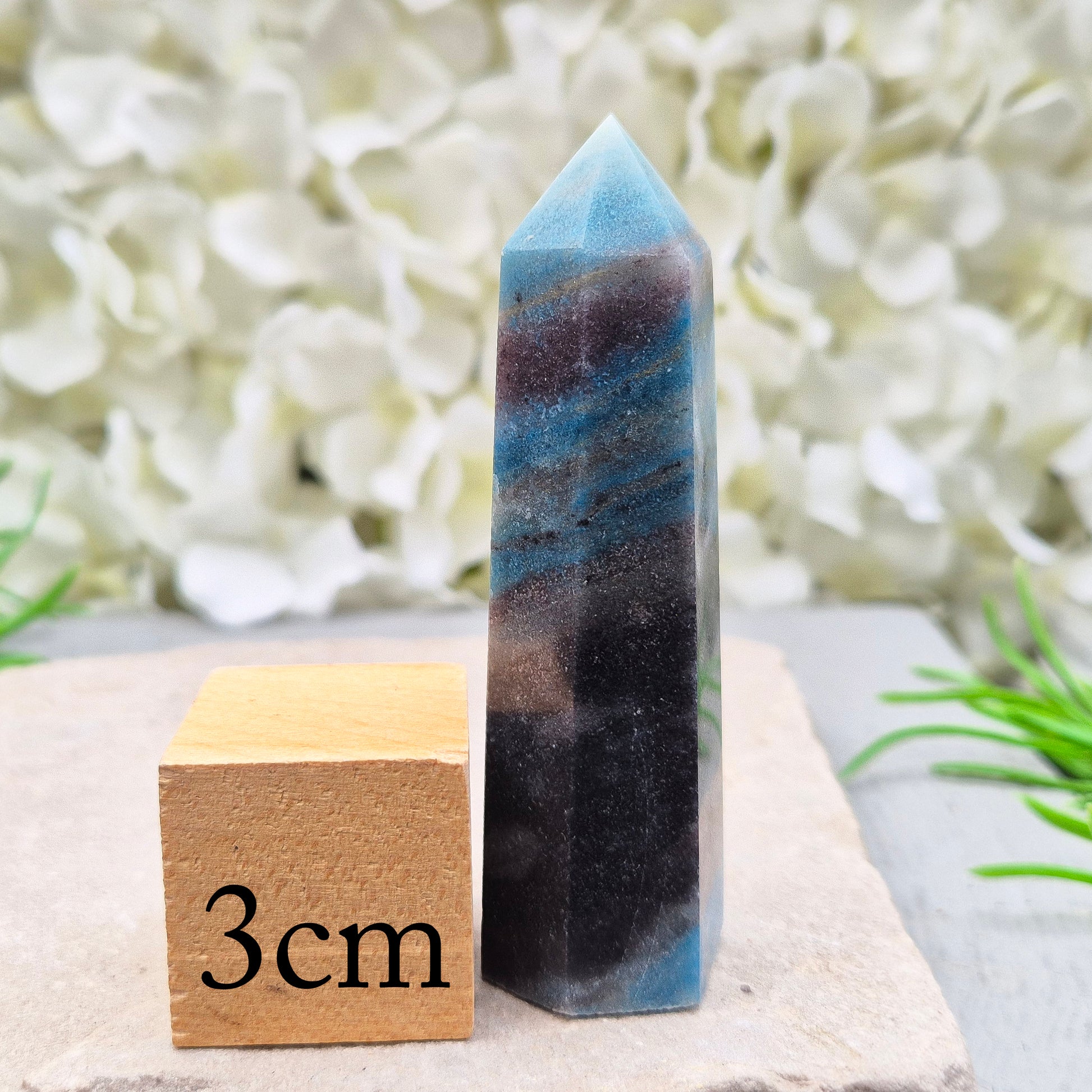 trolleite crystal tower – A calming, focus-enhancing crystal with a beautiful bluish-gray hue, perfect for reflection and personal insight. 