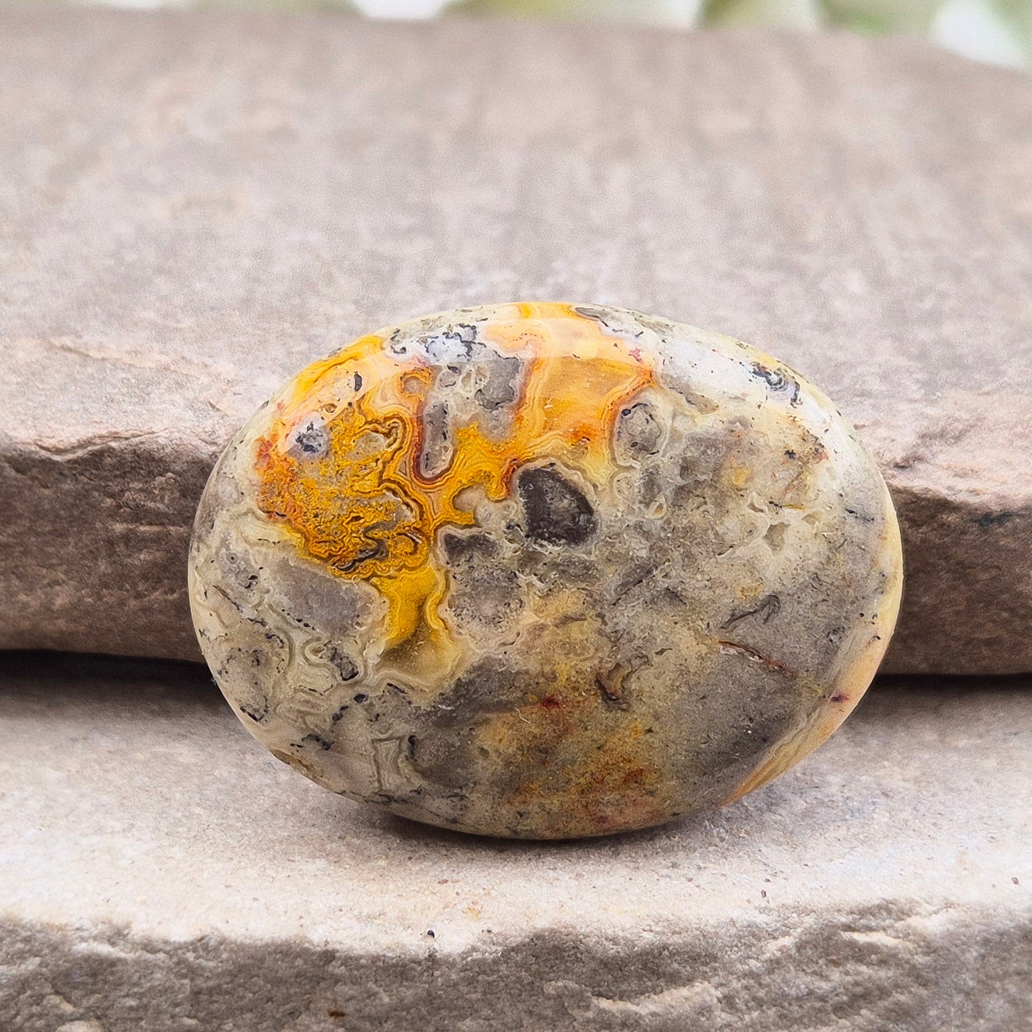 Discover natural Crazy Lace Agate palm stones from Mexico. Known for uplifting, grounding energy, optimism, emotional balance, and everyday positivity.