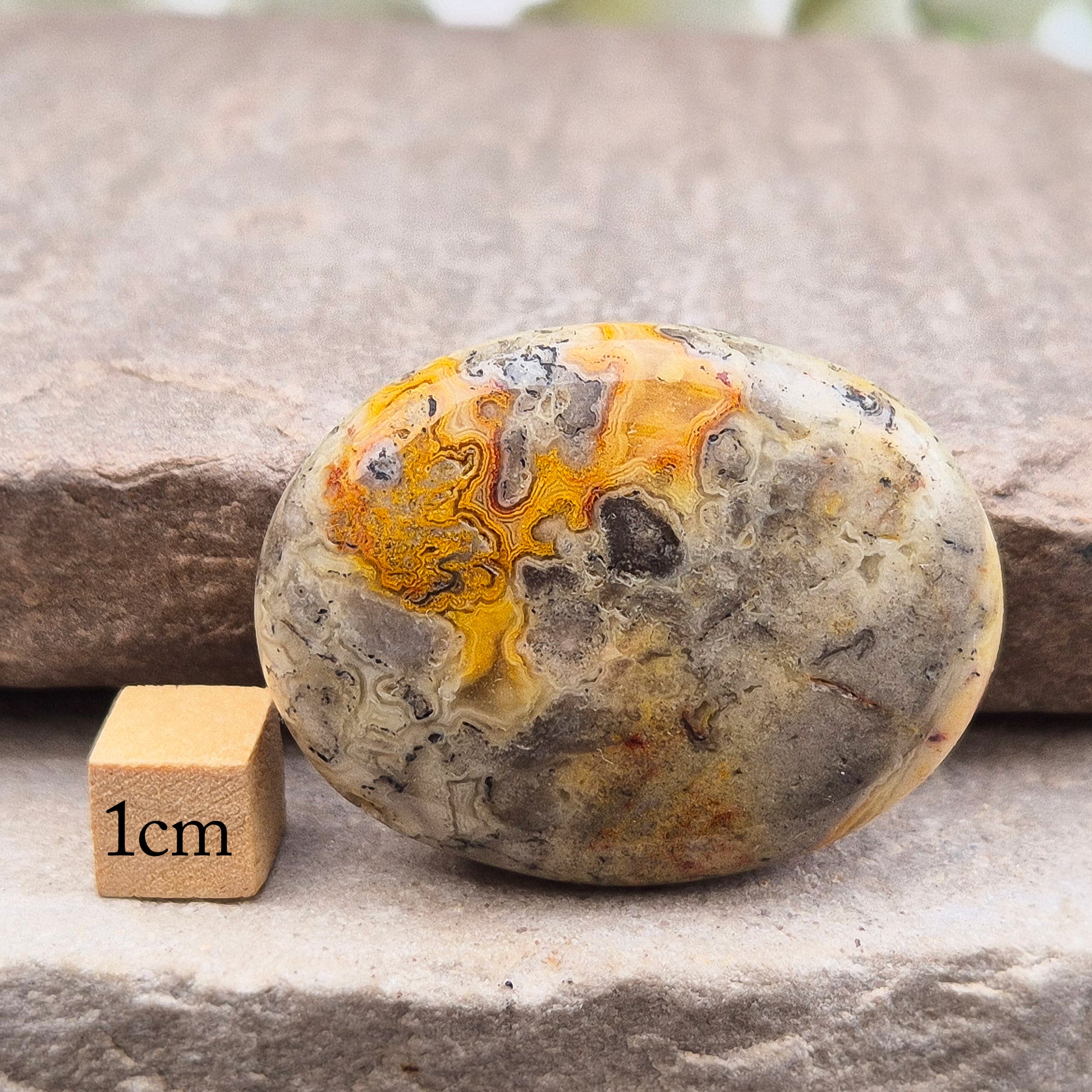 Discover natural Crazy Lace Agate palm stones from Mexico. Known for uplifting, grounding energy, optimism, emotional balance, and everyday positivity.