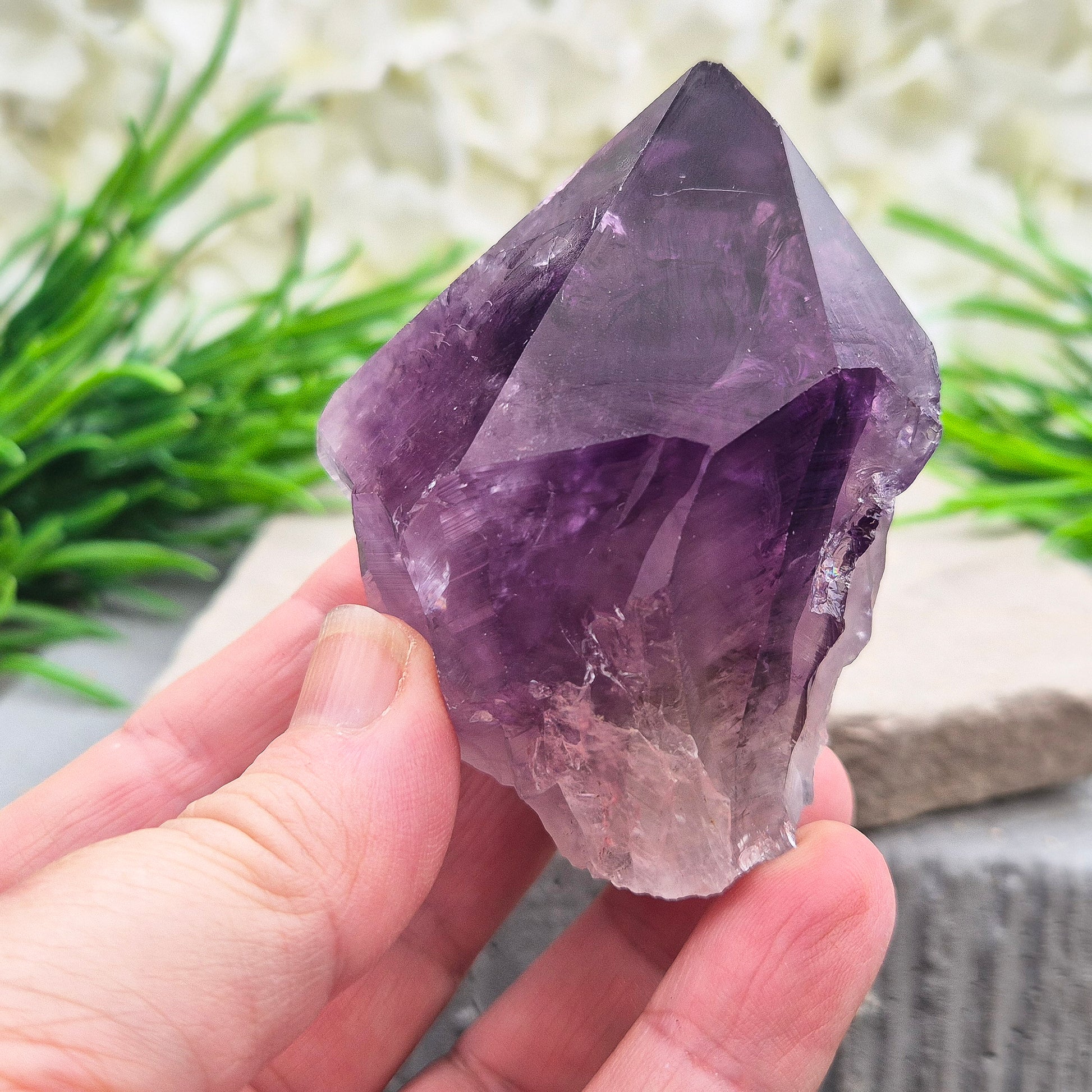 Deep purple Amethyst standing point with polished tip. A calming crystal for bedrooms, desks, and peaceful personal spaces.