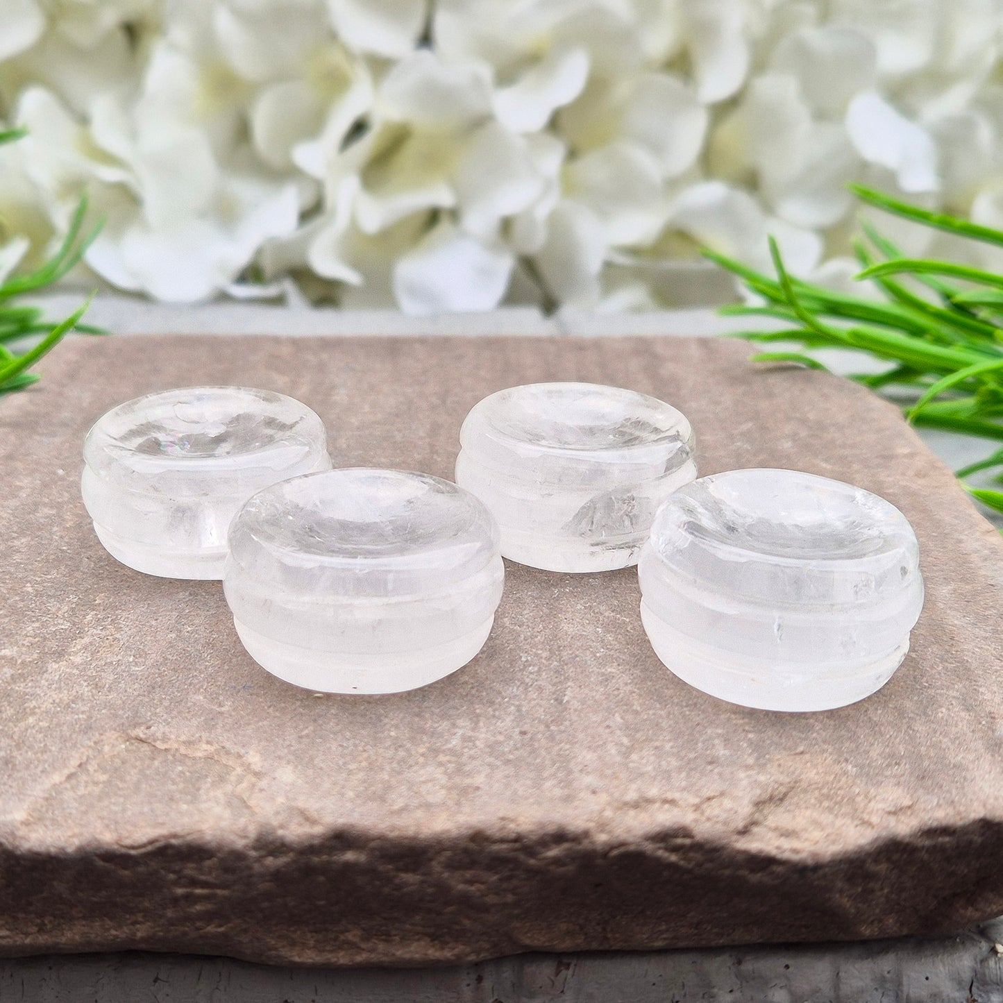 Polished Clear Quartz sphere holder made from natural Brazilian quartz. A bright, balanced display stand for crystal balls and collectors.