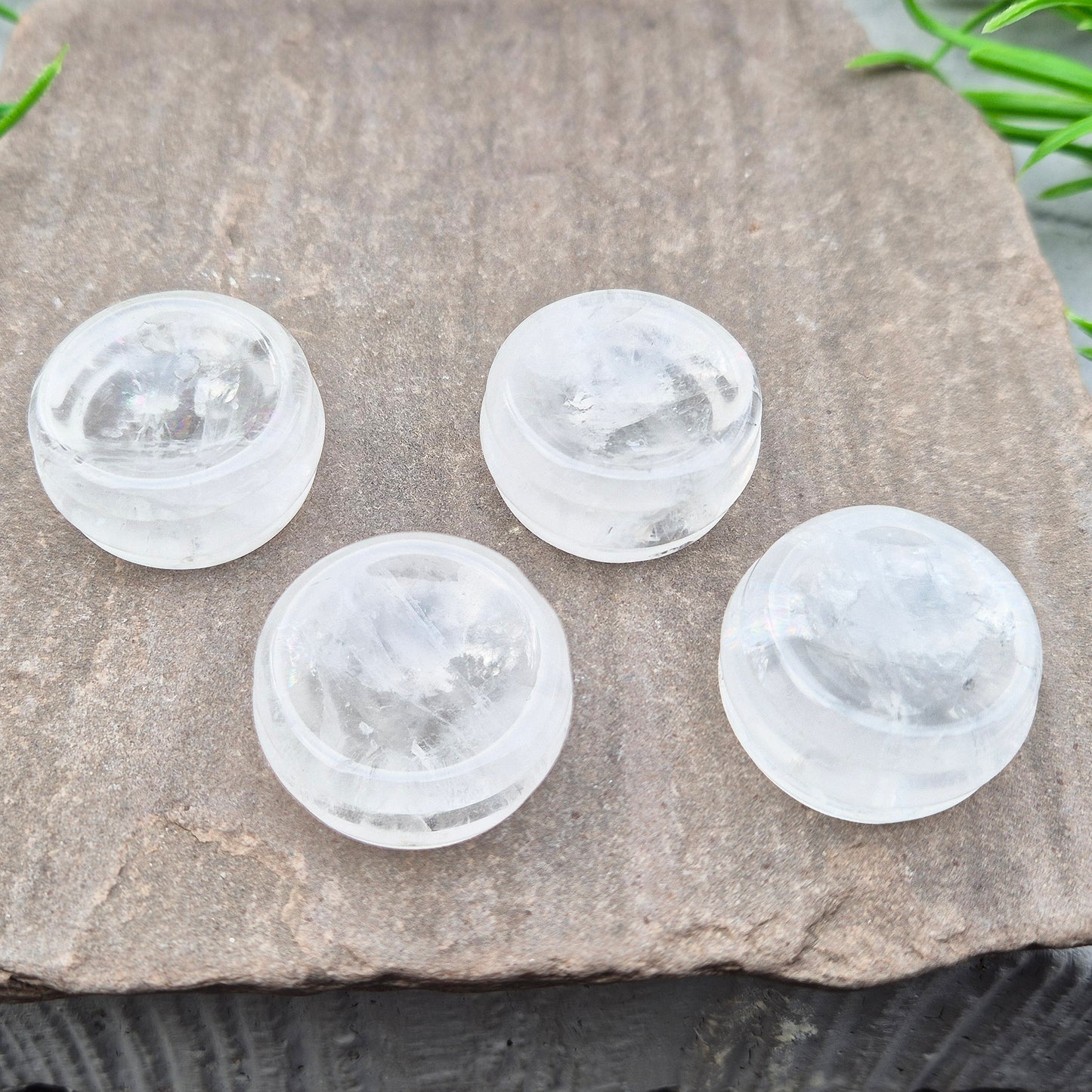 Polished Clear Quartz sphere holder made from natural Brazilian quartz. A bright, balanced display stand for crystal balls and collectors.