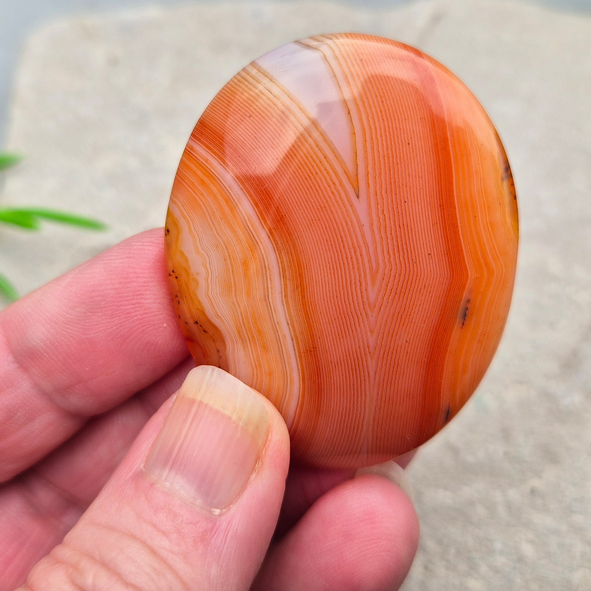 Banded Carnelian palm stone from Madagascar. Boosts motivation, confidence and creativity. Grounding Root and Sacral crystal for energy and focus. 