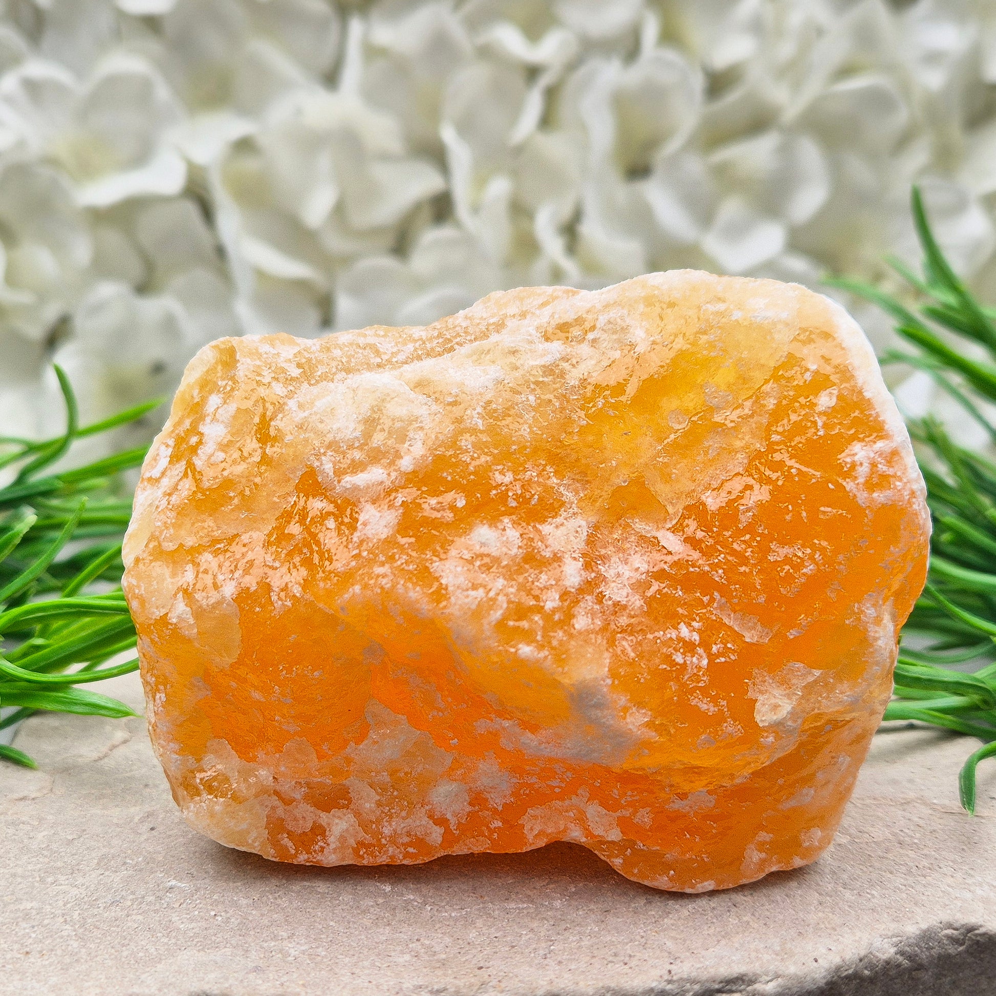 Natural Orange Calcite standing stone from Mexico. A warm, uplifting crystal for motivation, confidence, and brighter, more energised spaces.