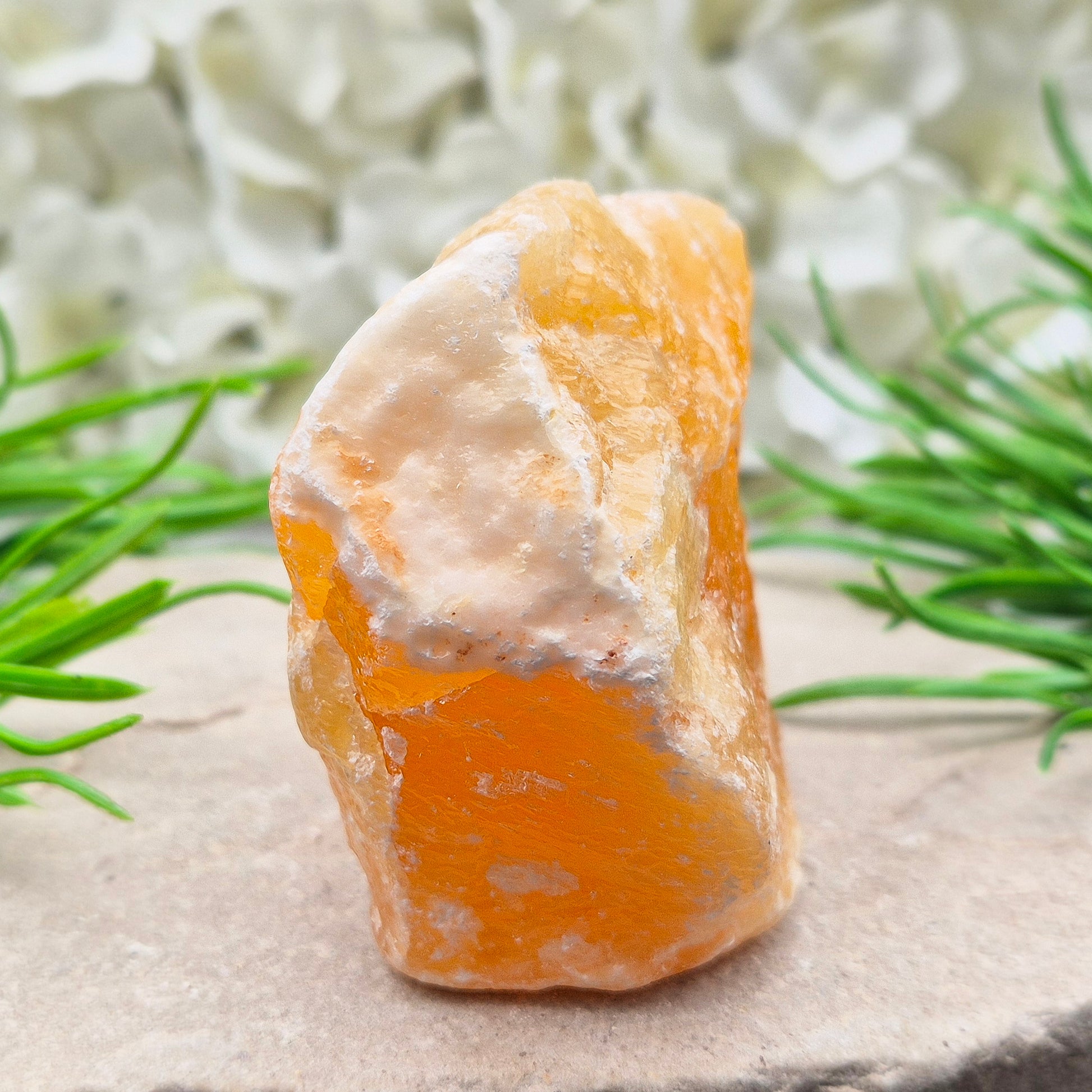 Natural Orange Calcite standing stone from Mexico. A warm, uplifting crystal for motivation, confidence, and brighter, more energised spaces.