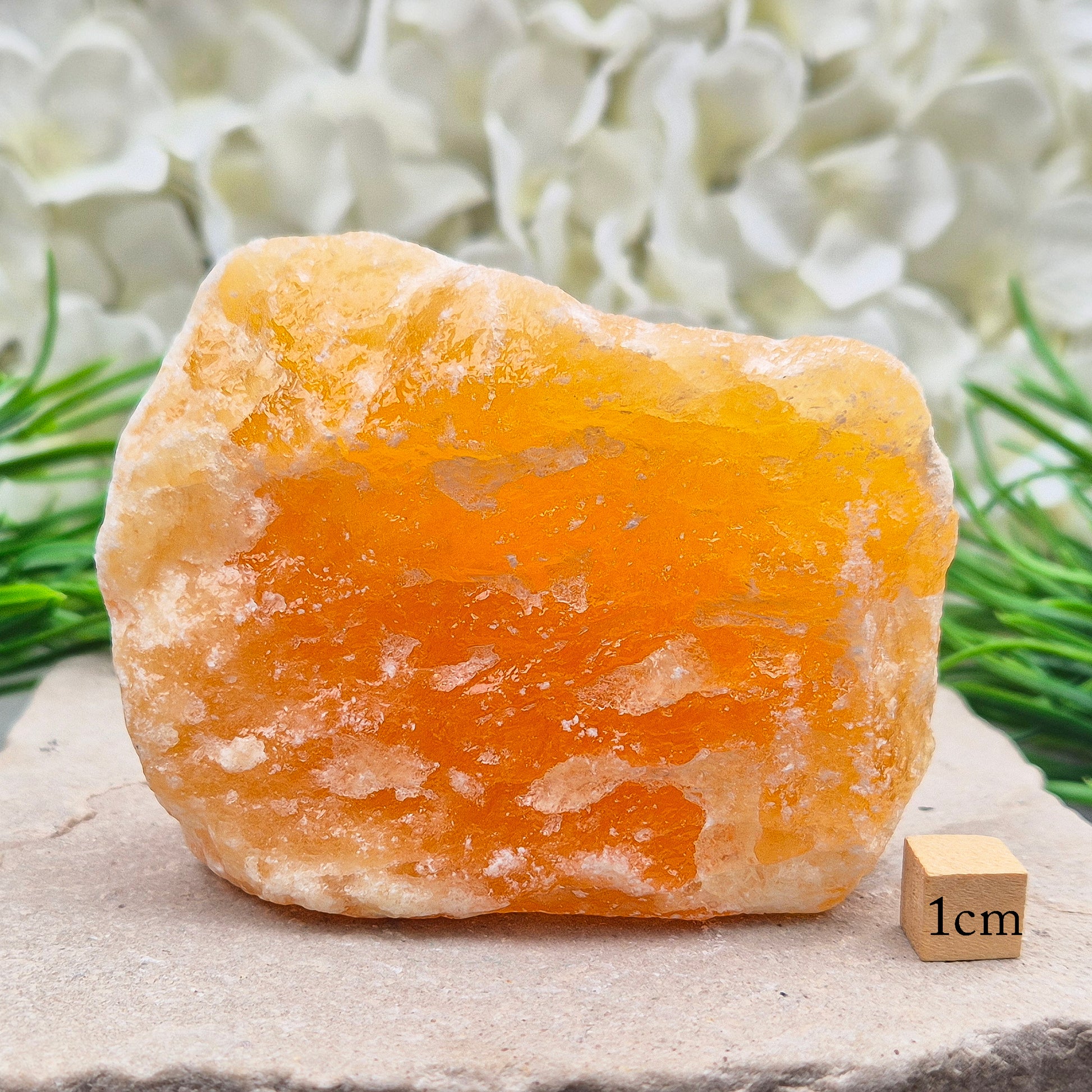 Natural Orange Calcite standing stone from Mexico. A warm, uplifting crystal for motivation, confidence, and brighter, more energised spaces.