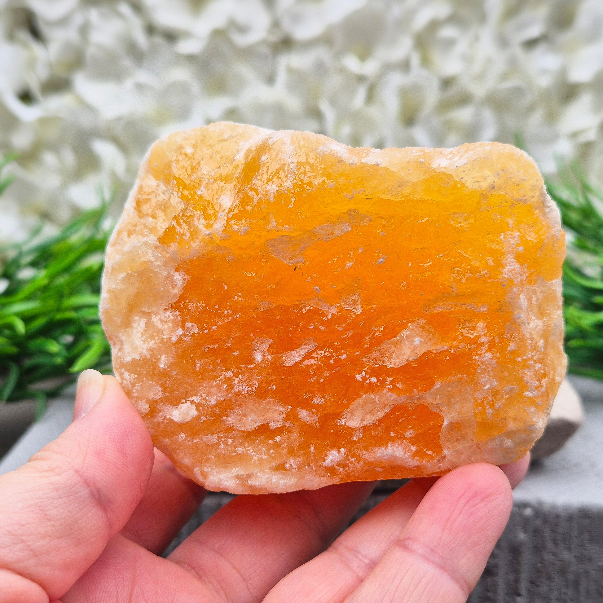 Natural Orange Calcite standing stone from Mexico. A warm, uplifting crystal for motivation, confidence, and brighter, more energised spaces.