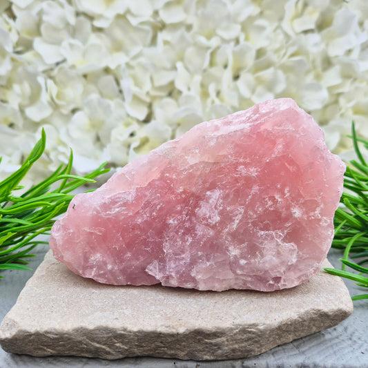 Natural Rose Quartz crystal to display in your home. Promotes calm, self-love, and emotional balance while bringing harmony to your space. 