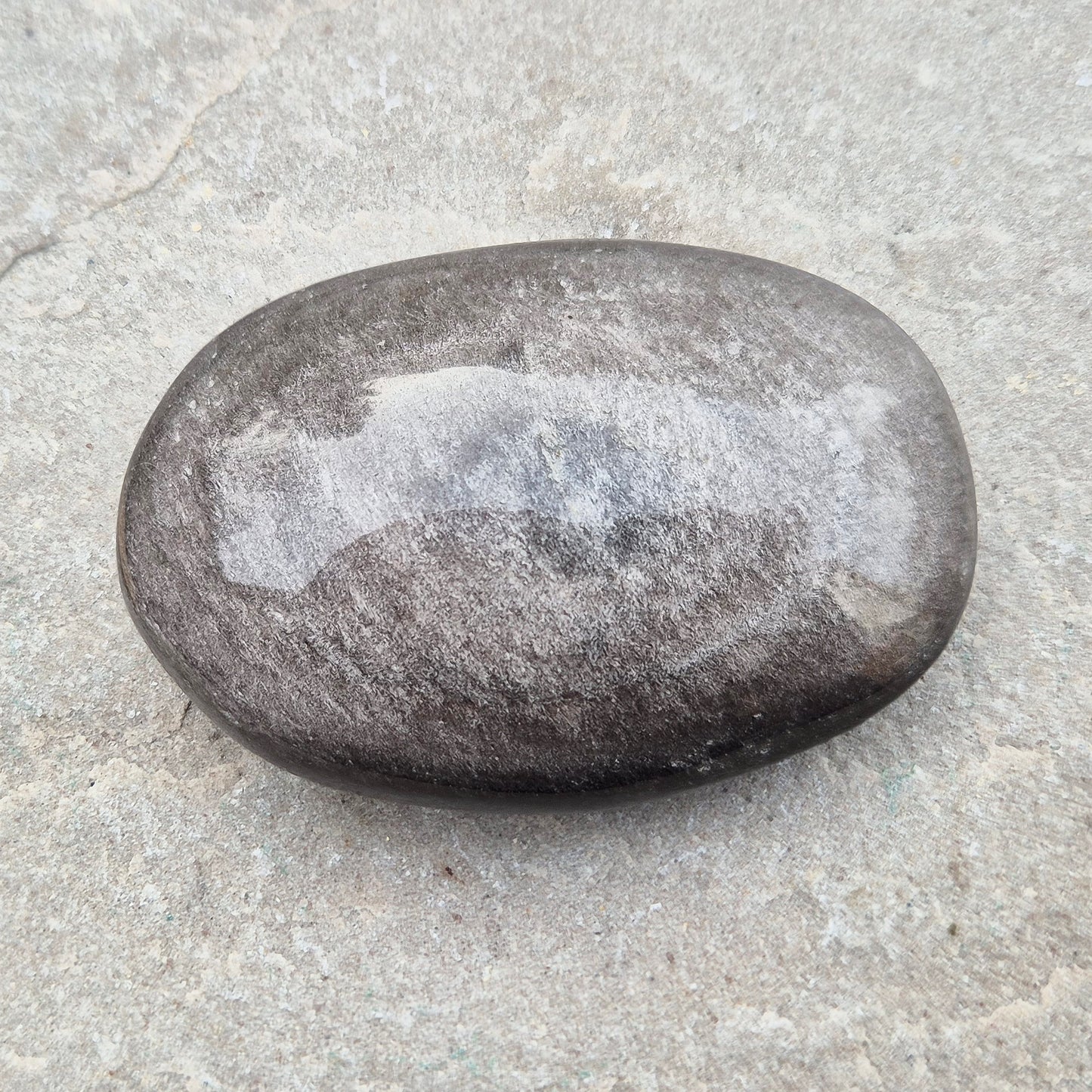 Grounding and protective Silver Sheen Obsidian crystal that enhances self-awareness, inner strength, and emotional balance.