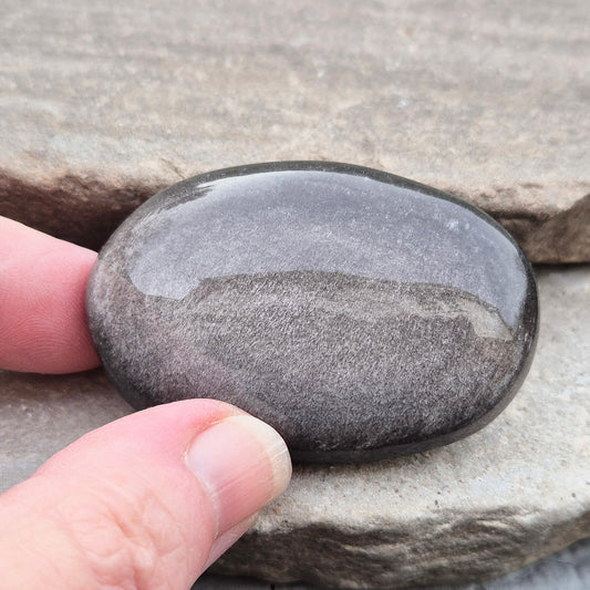 Grounding and protective Silver Sheen Obsidian crystal that enhances self-awareness, inner strength, and emotional balance.