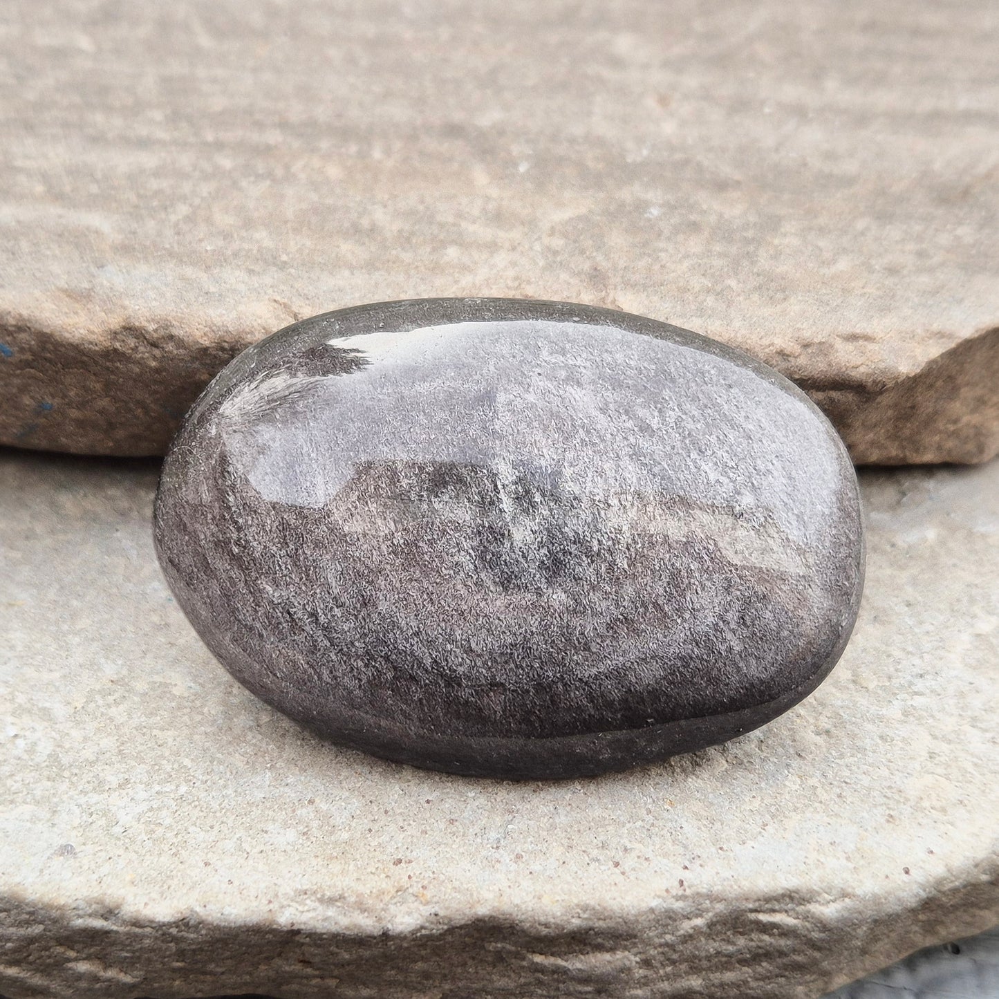 Grounding and protective Silver Sheen Obsidian crystal that enhances self-awareness, inner strength, and emotional balance.