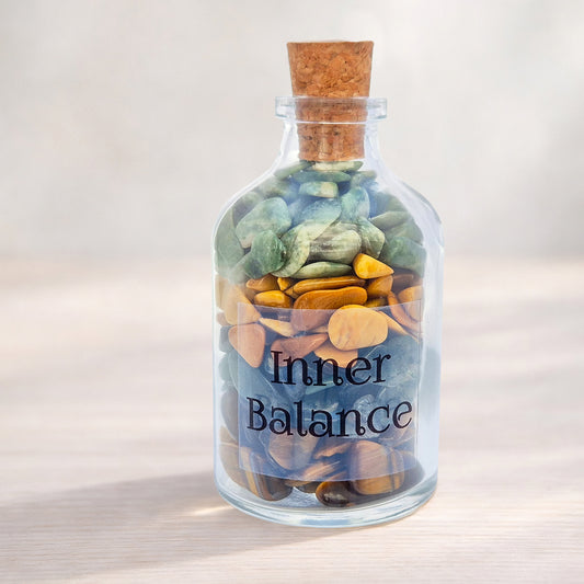 Inner Balance crystal bottle with jade, tiger eye, moss agate and jasper. A grounding decorative blend for calm focus, steady confidence and thoughtful gifting.