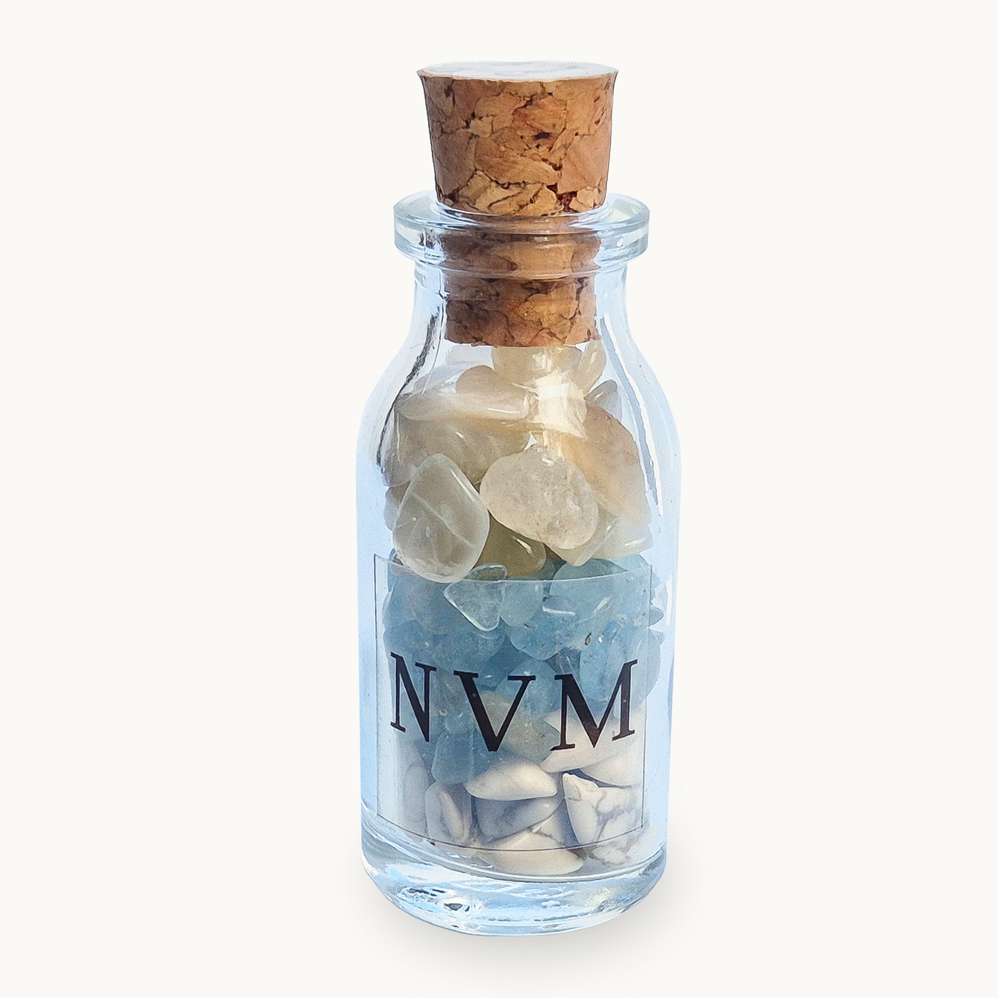 NVM Never Mind crystal blend bottle with howlite, aquamarine and moonstone. A decorative grounding piece for letting go, emotional reset and calm detachment.