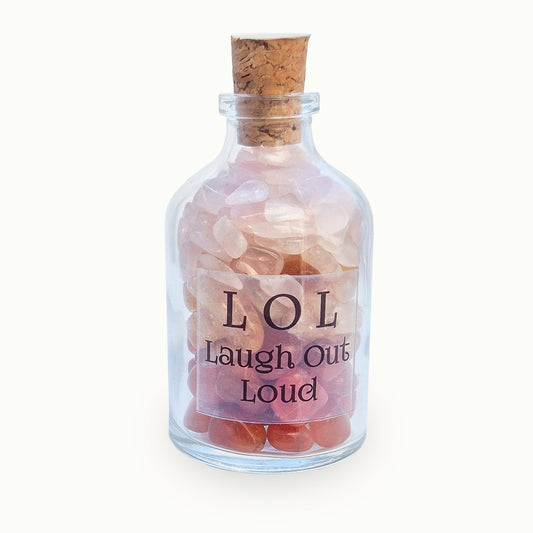 LOL Laugh Out Loud crystal bottle with citrine, carnelian and rose quartz. A warm, uplifting decorative blend for brighter days and thoughtful gifting.