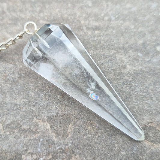 Clear Quartz crystal pendulum for divination, dowsing, and intuitive guidance. A versatile stone for clarity, focus, and balanced energy. 