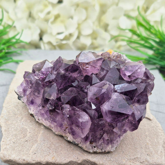 Amethyst crystal cluster with natural points, chosen for its calming energy and peaceful presence. A beautiful display stone for home, meditation, or gifting.