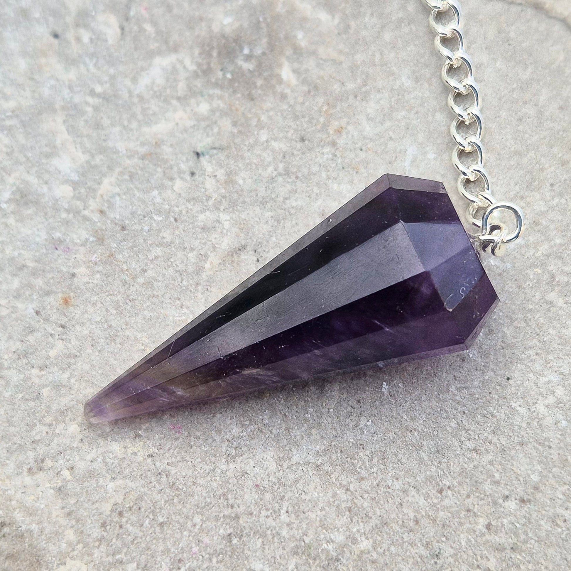 Dark Amethyst pendulum with rich natural colour, ideal for dowsing, divination, and energy work. A beautiful tool for spiritual practice, tarot readings, and crystal healing.