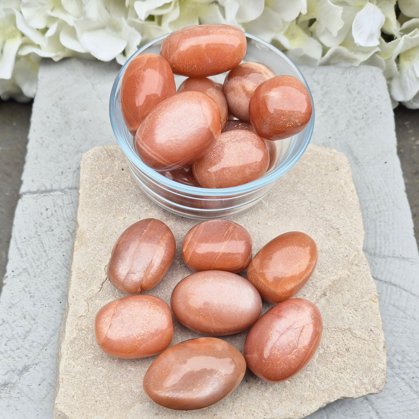 Golden Feldspar XL tumble stone with warm golden colour and natural sparkle. A crystal associated with optimism, creativity, and personal confidence.