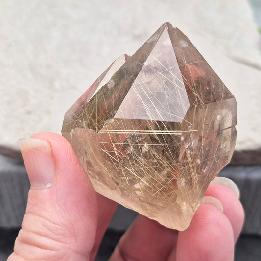 Golden Rutilated Quartz multi-point crystal from Brazil featuring fine golden rutile needles. A striking natural specimen associated with focus, motivation, and fresh ideas.